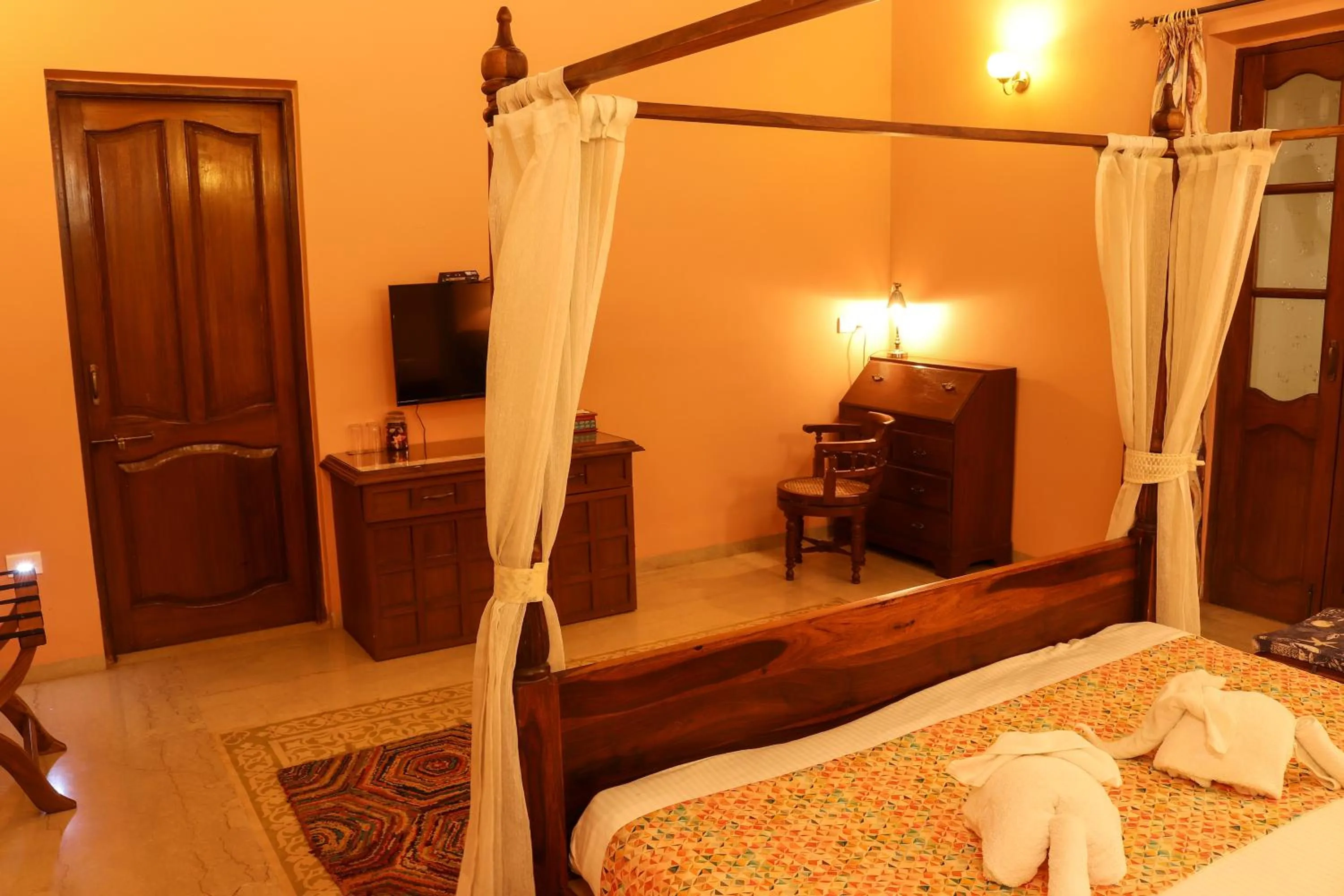 Bed in Surya Kiran Heritage Hotel