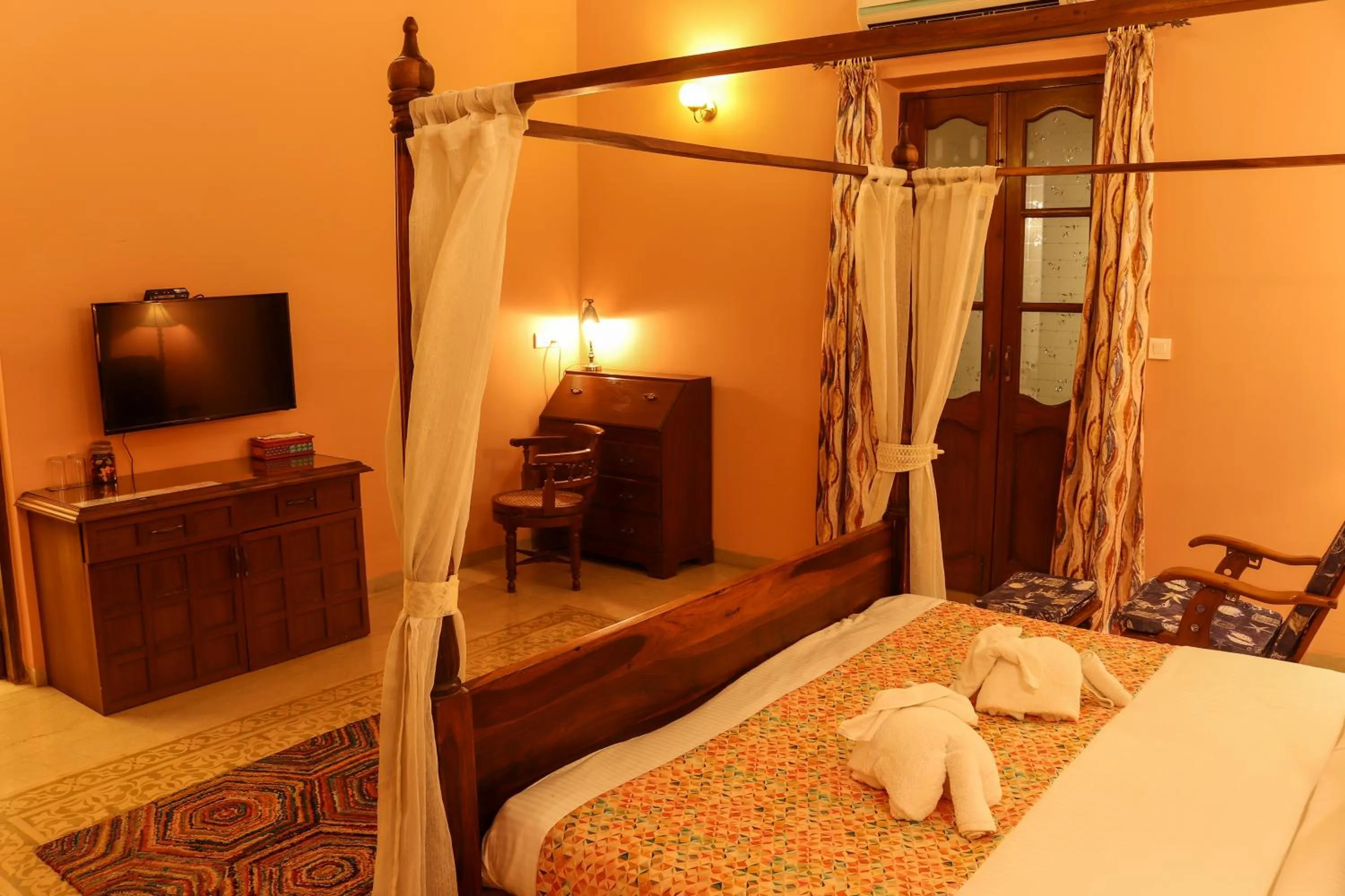 Bed in Surya Kiran Heritage Hotel