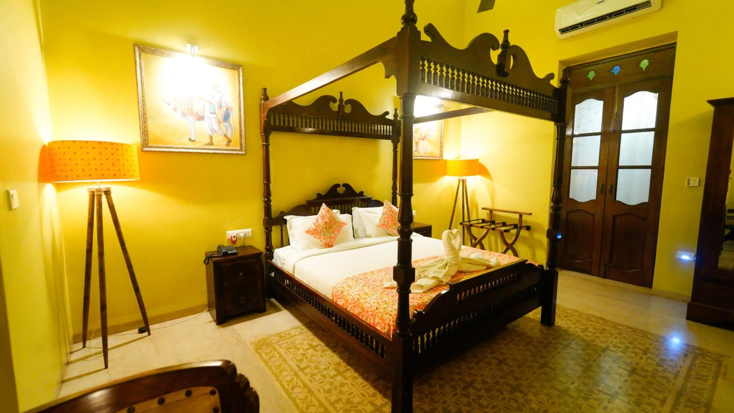 Bed in Surya Kiran Heritage Hotel