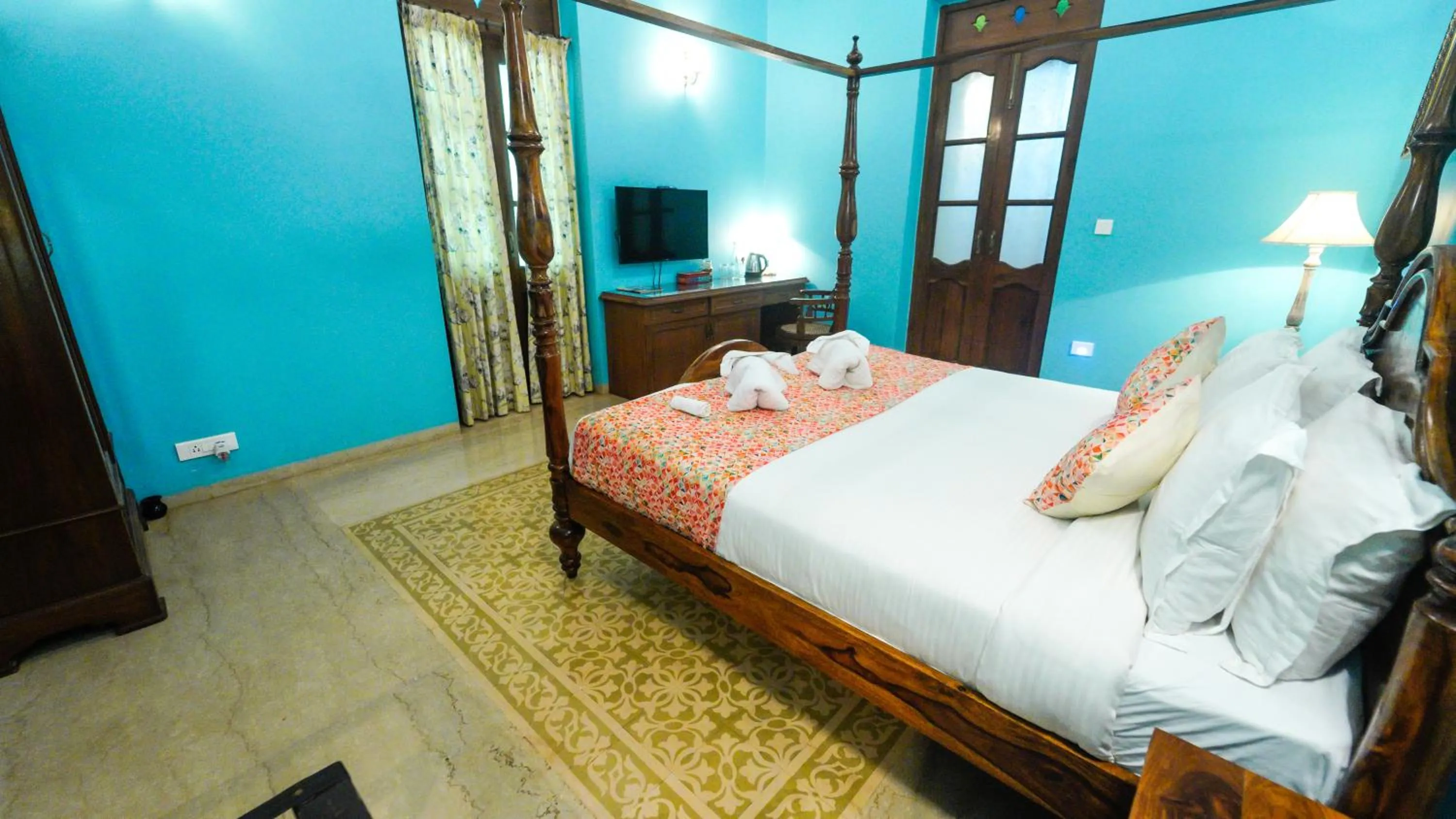 Bed in Surya Kiran Heritage Hotel