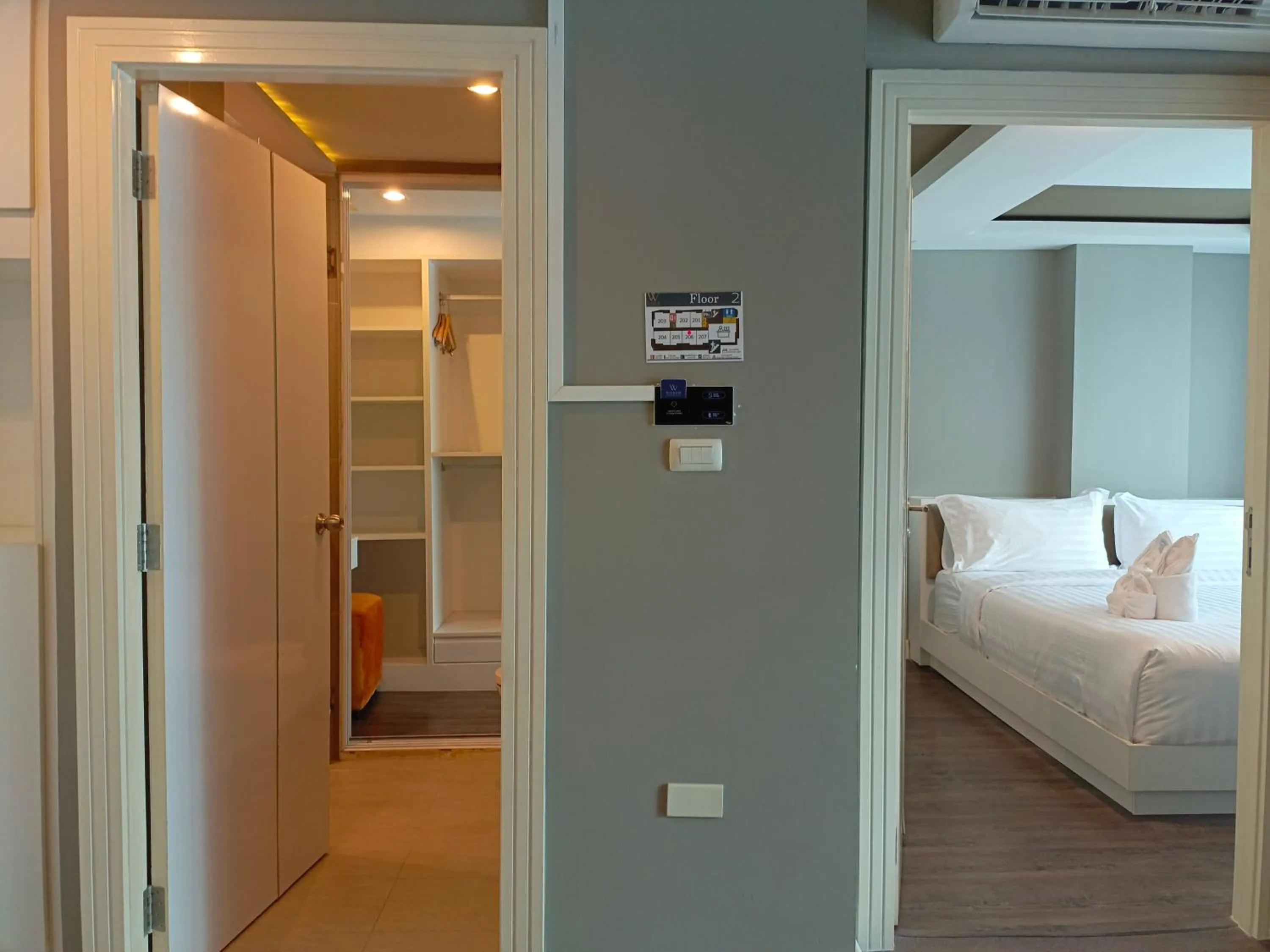 Bed in Wisdom Hotel & Residence