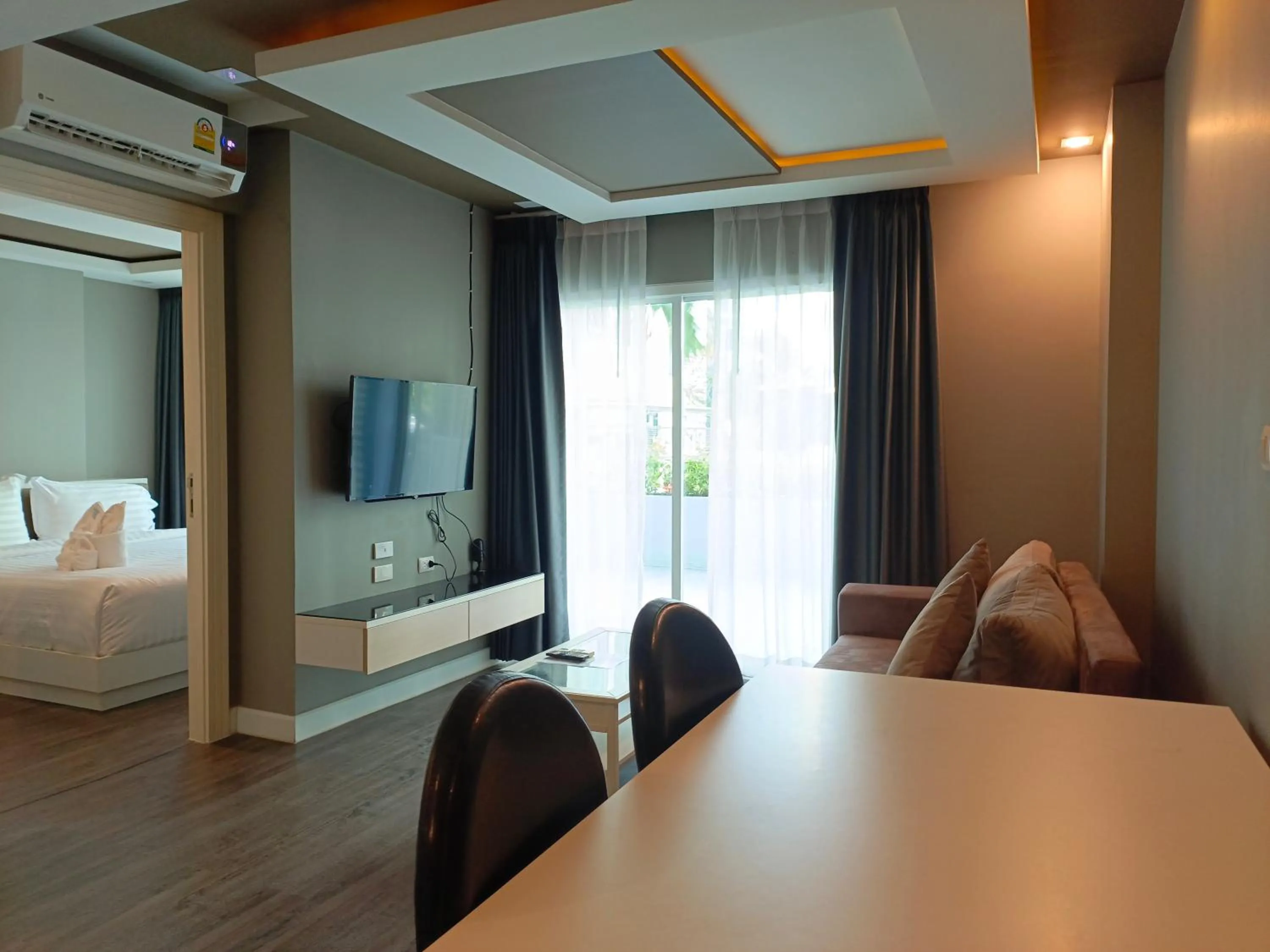 Bed in Wisdom Hotel & Residence