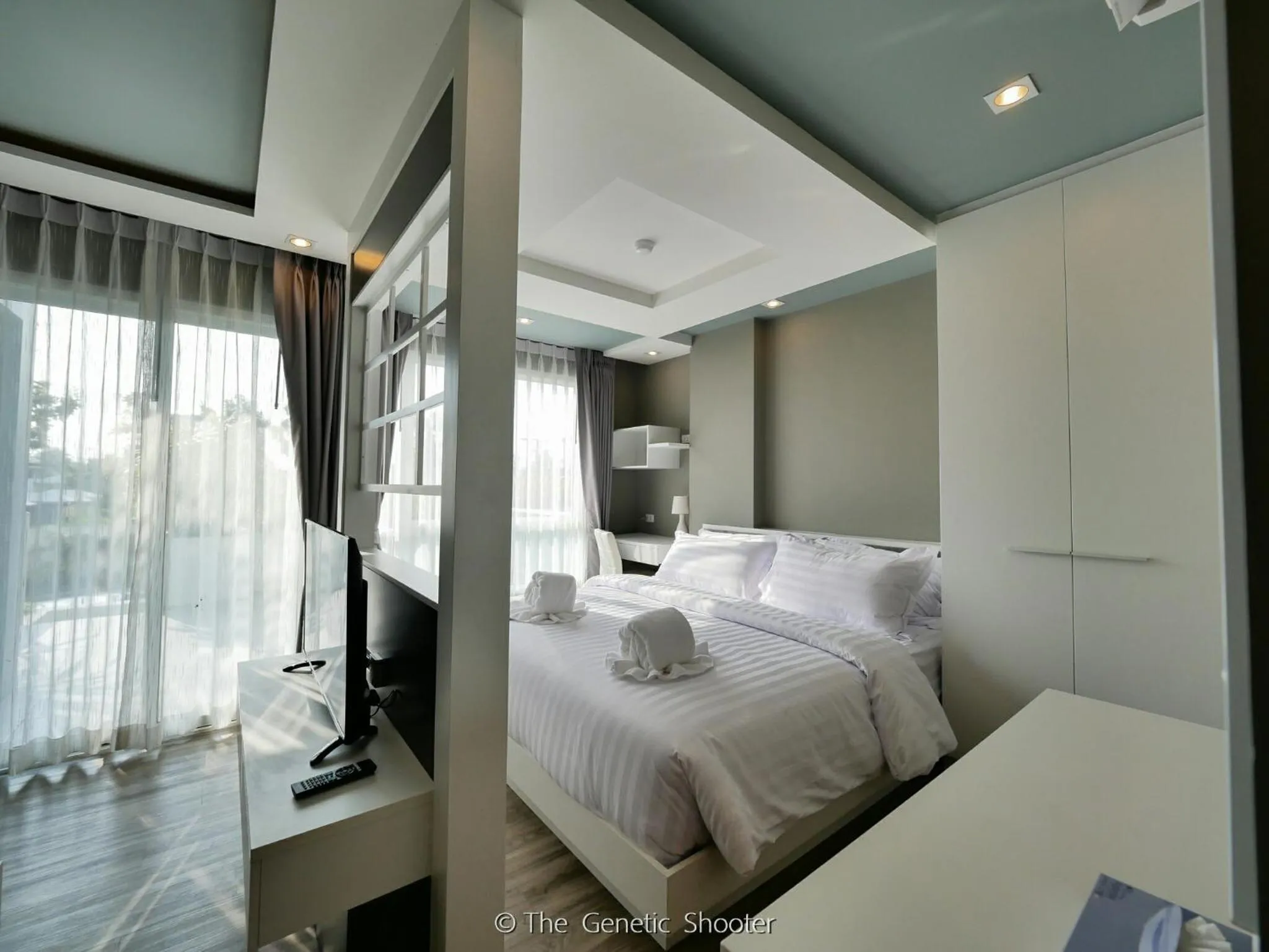 Bed in Wisdom Hotel & Residence