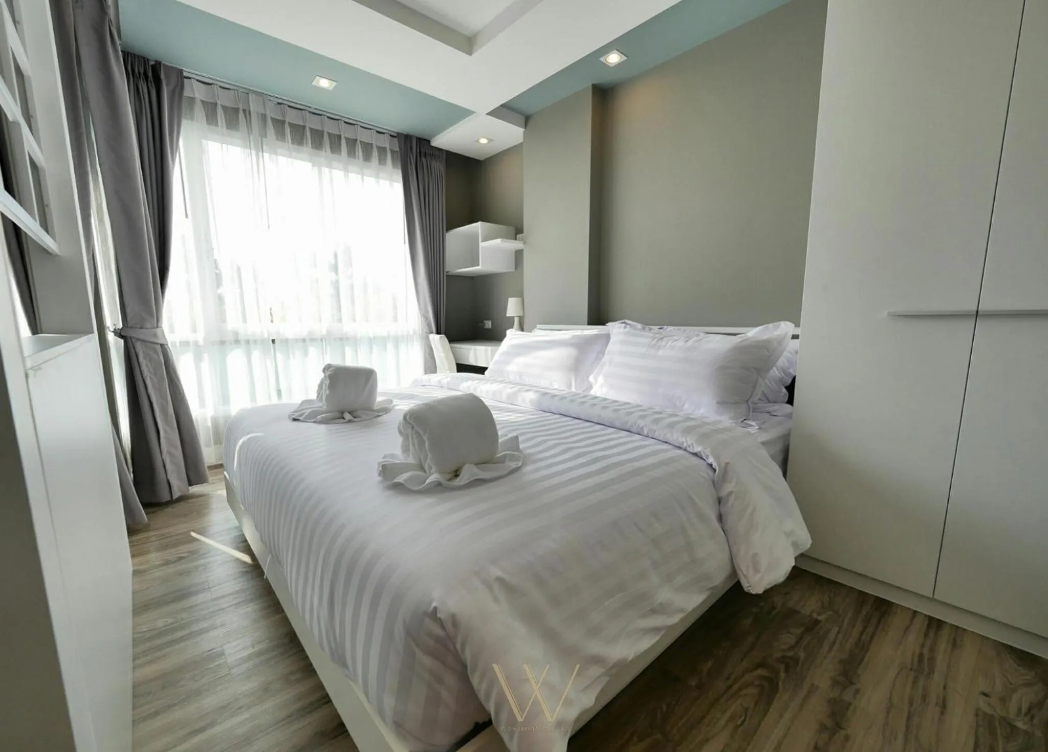 Bed in Wisdom Hotel & Residence