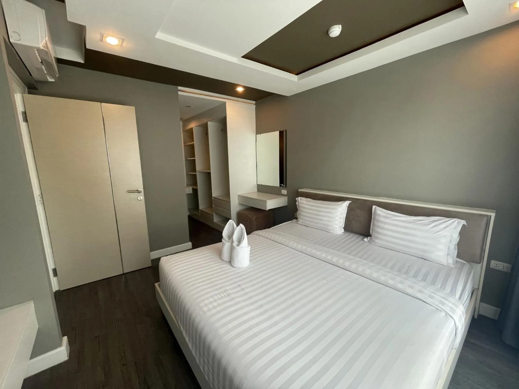 Bed in Wisdom Hotel & Residence