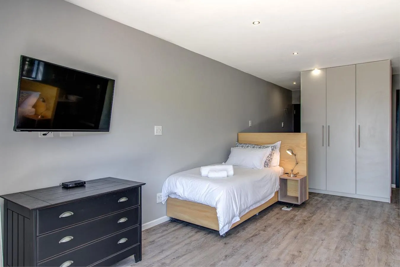 Bed in Sky Blue Guest House