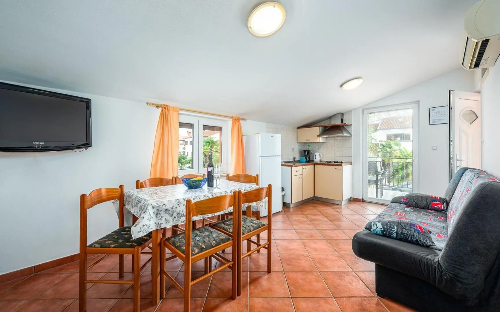 Seating area in ALEKS house with apartments