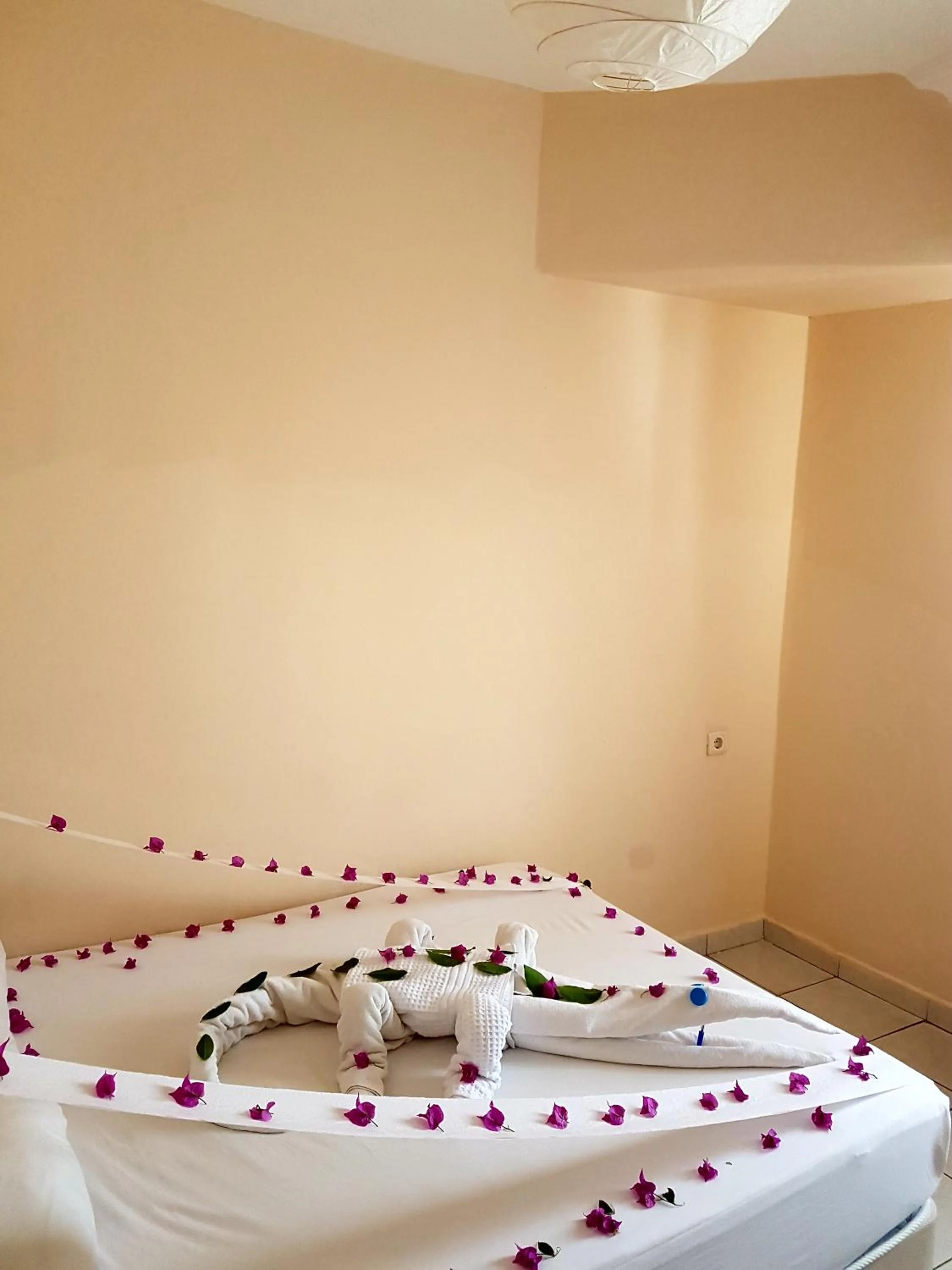 Bed in Palmen Apart Hotel