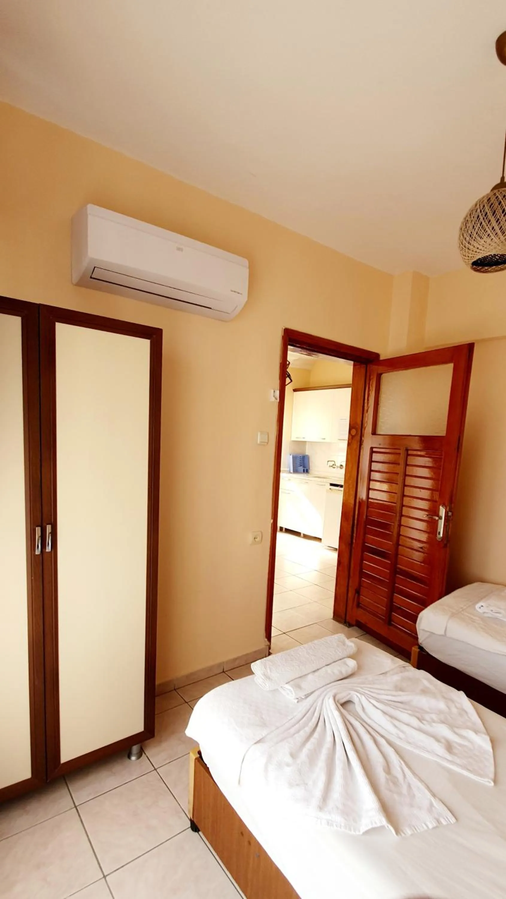 Bed in Palmen Apart Hotel