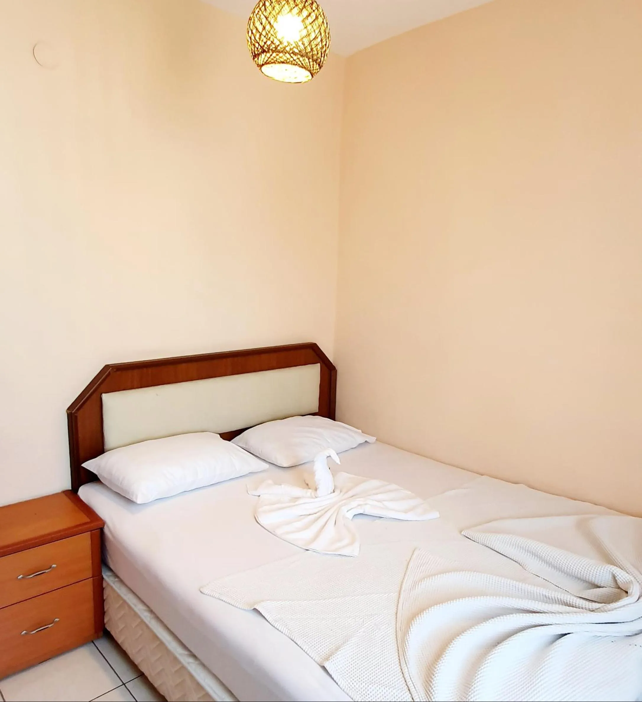 Bed in Palmen Apart Hotel