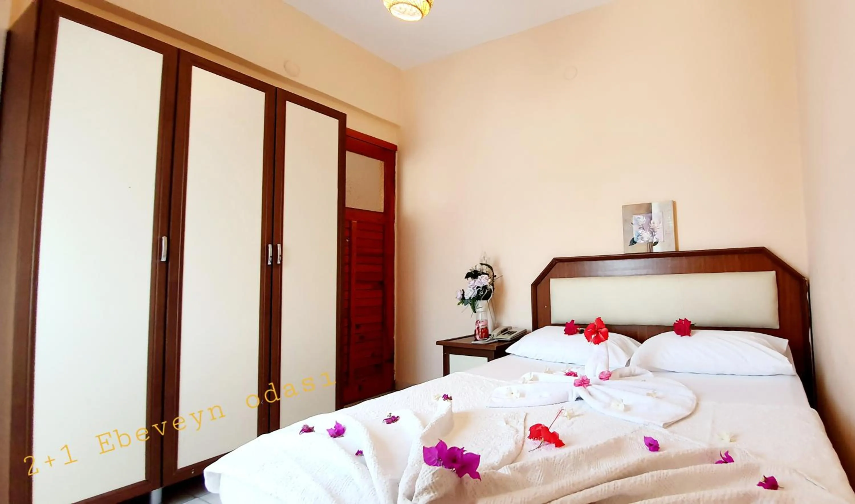 Bed in Palmen Apart Hotel