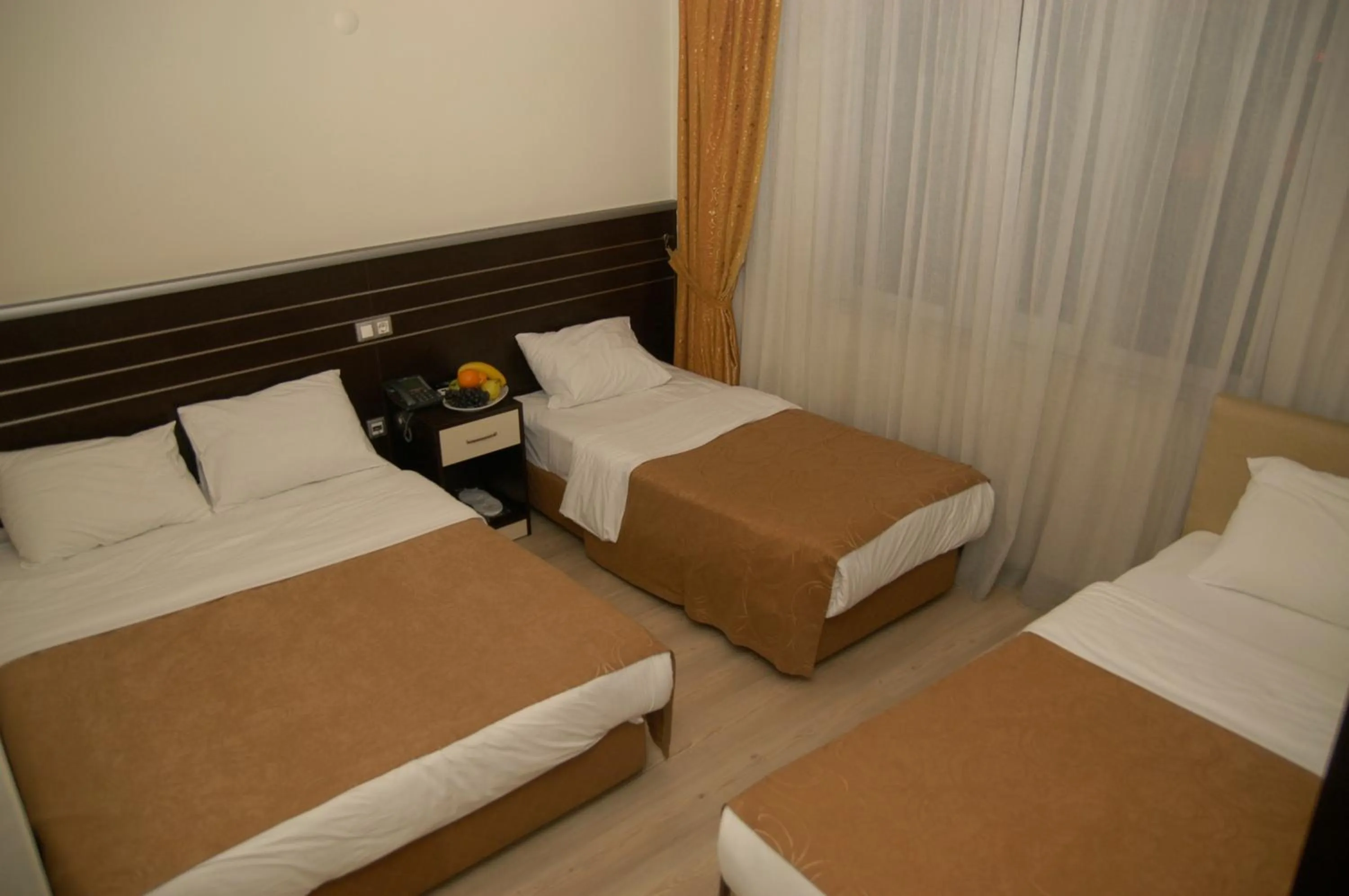 Bed in Merdan Hotel