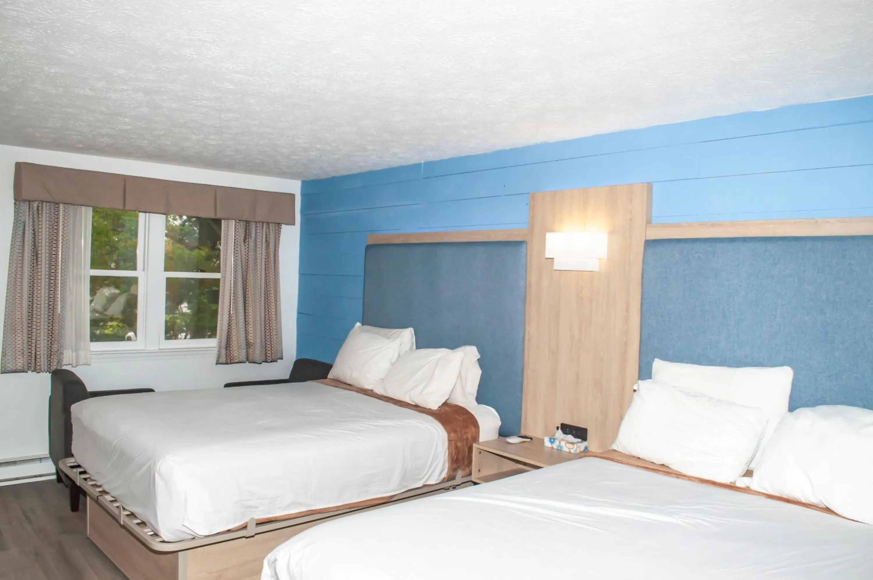 Bed in Sea View Motel