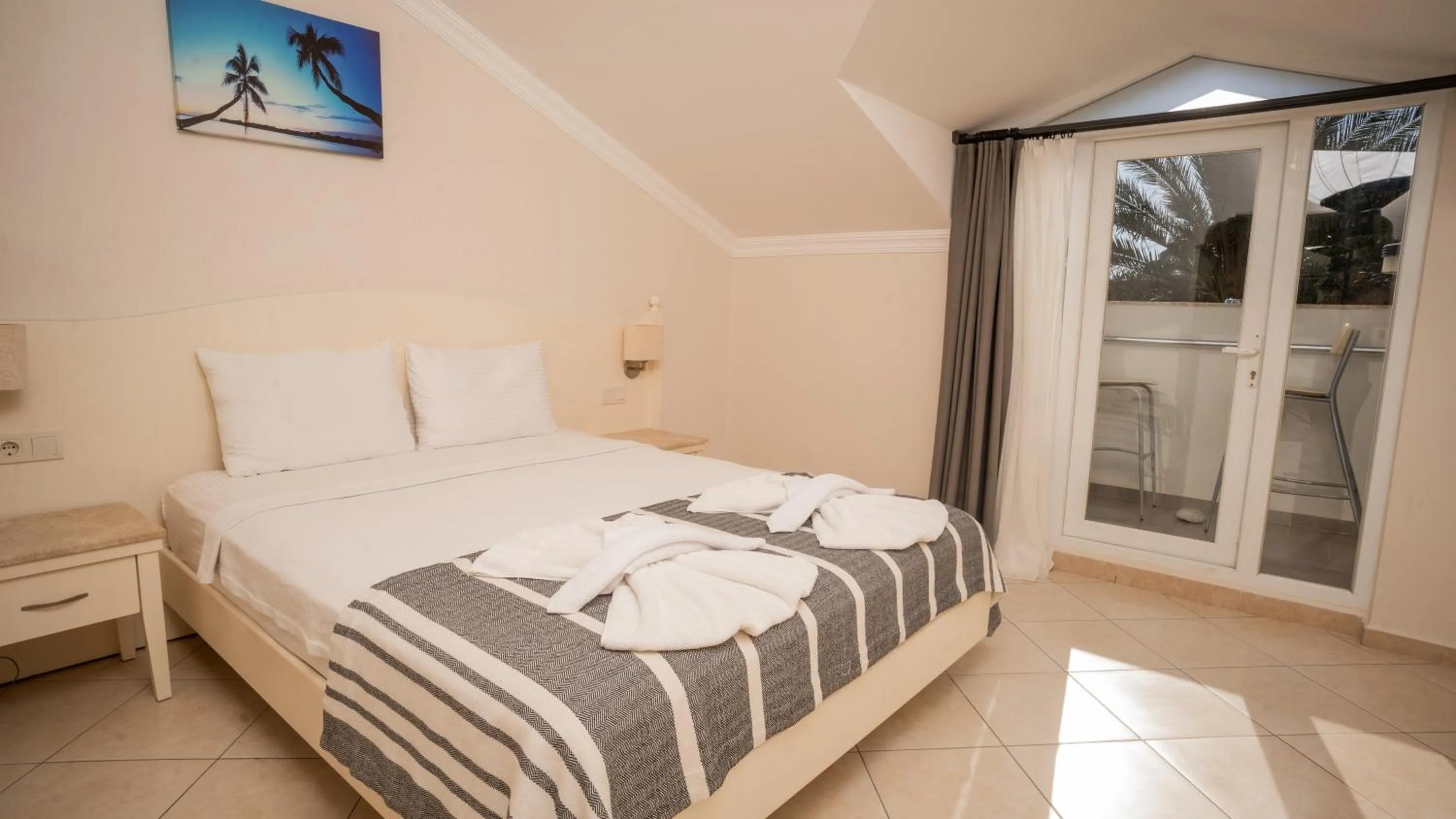 Bed in Blue Star Hotel