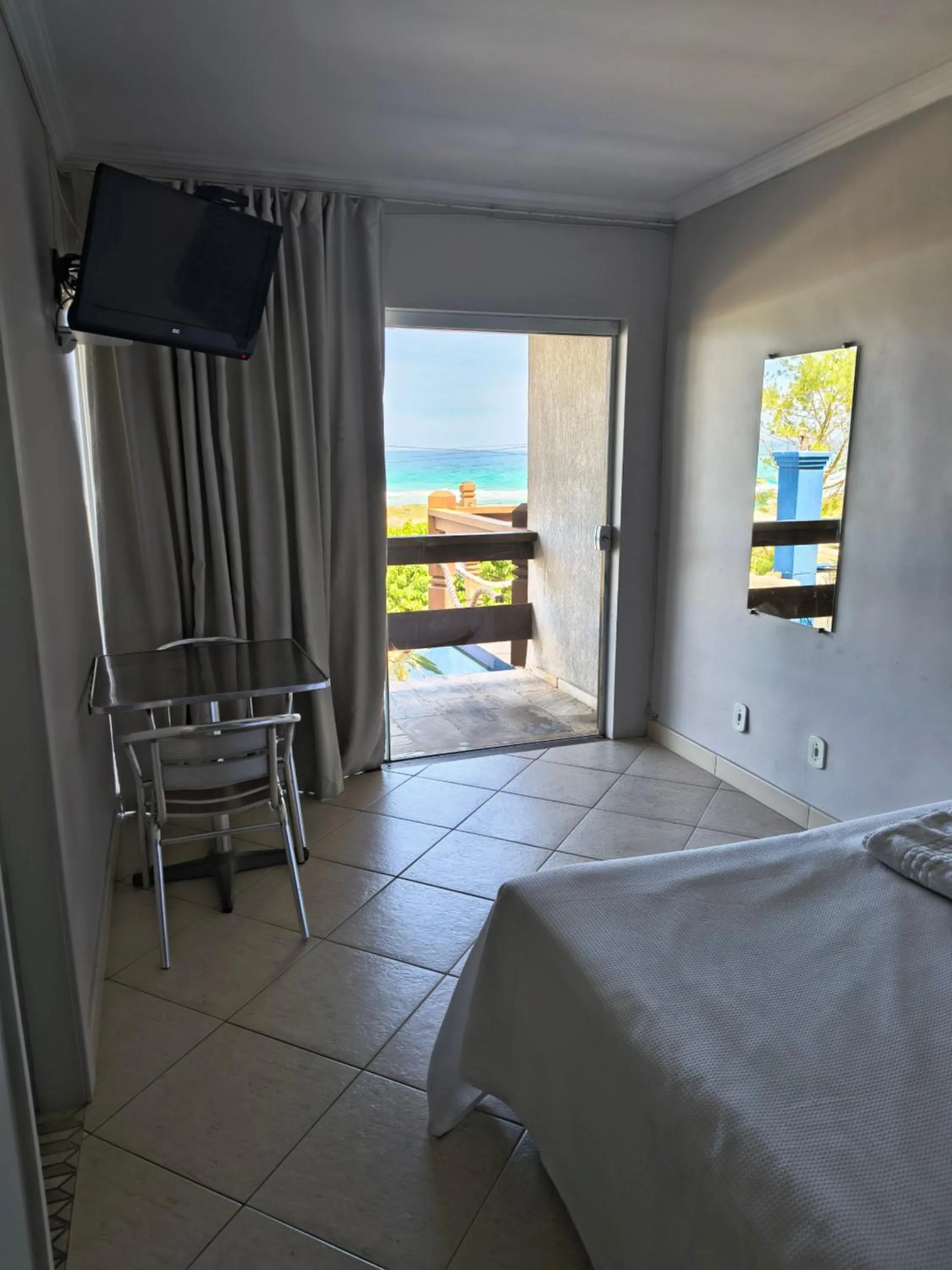 Bed in Pousada On Shore