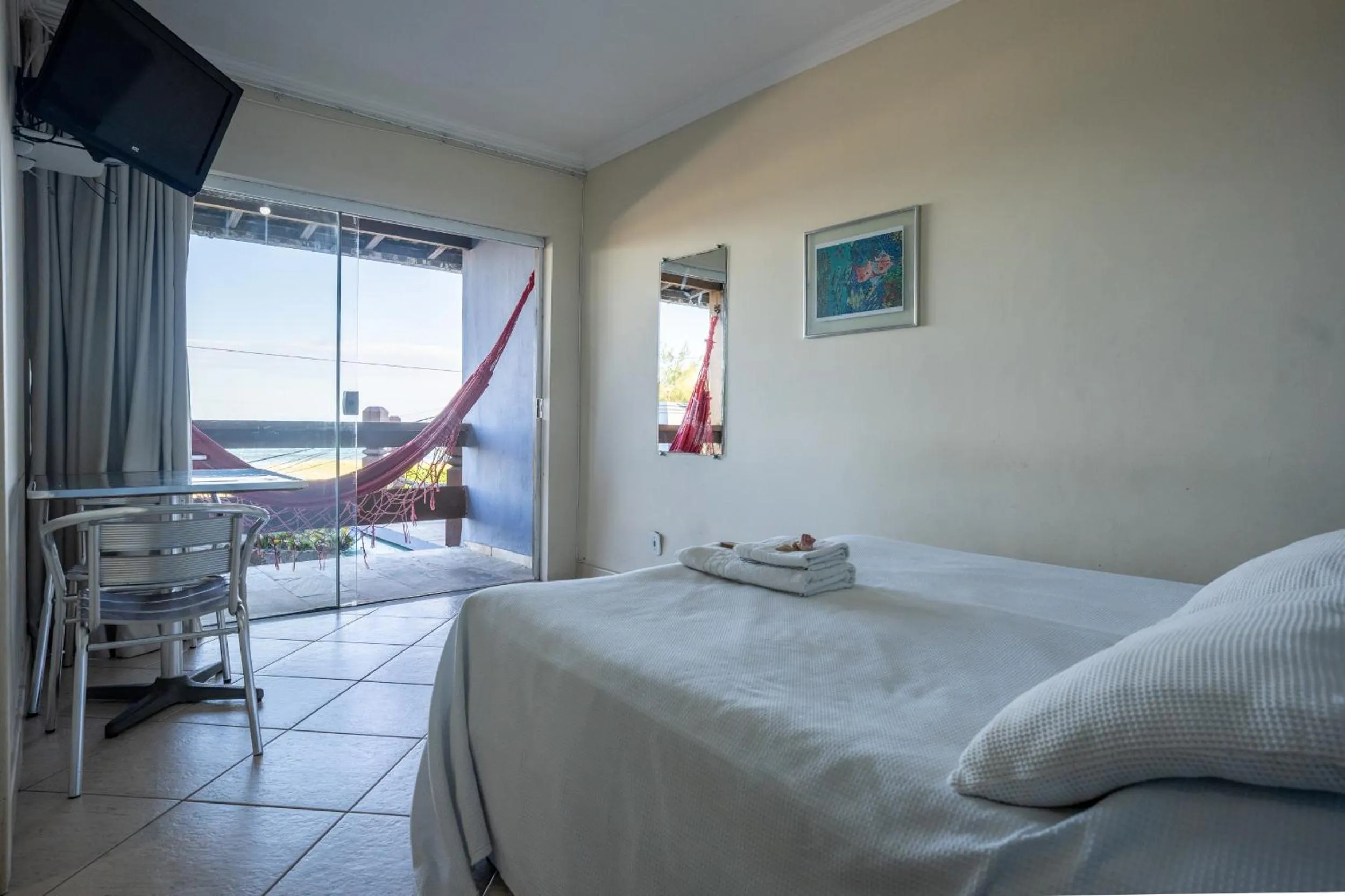 Bed in Pousada On Shore