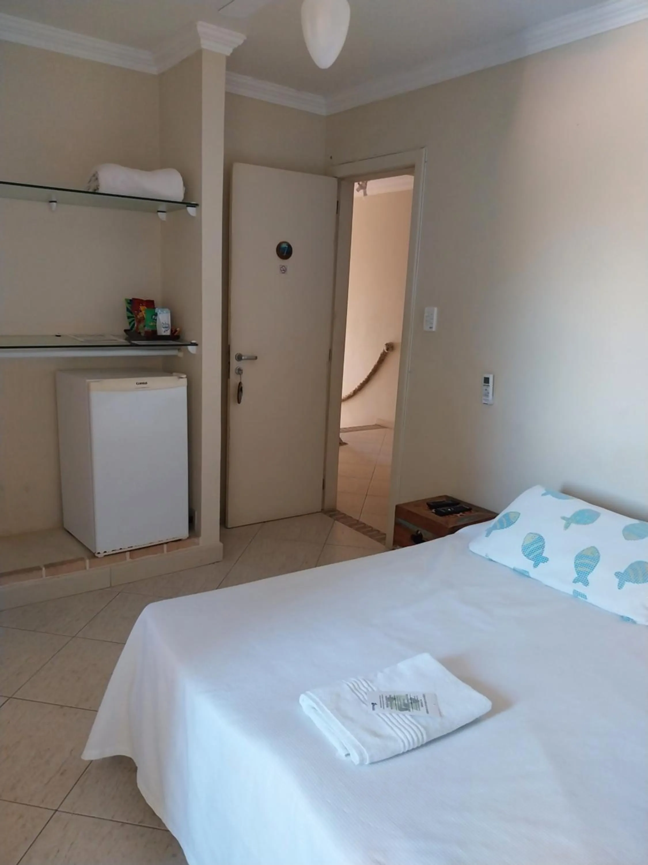 Bed in Pousada On Shore