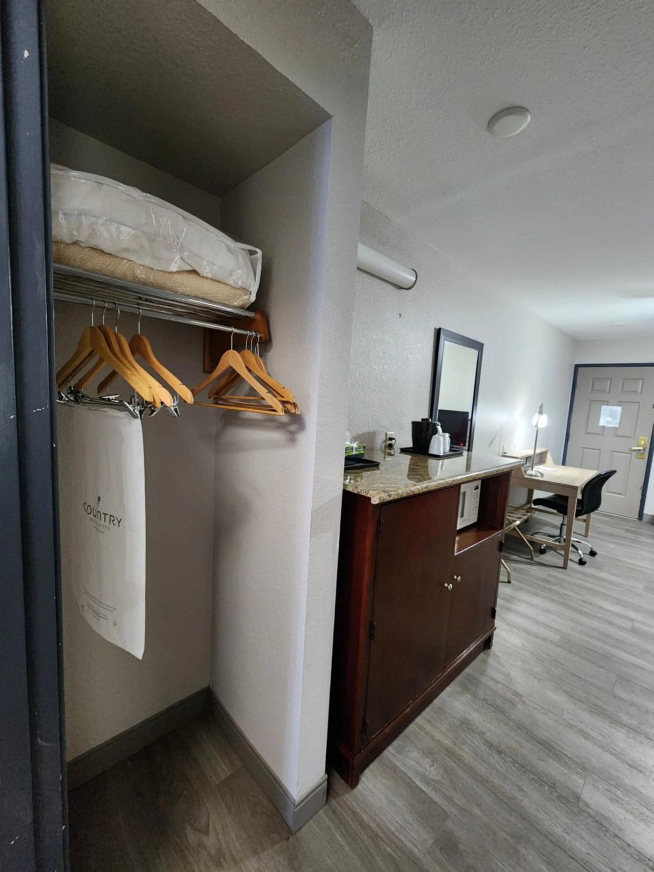 wardrobe in Country Inn & Suites by Radisson, Topeka West, KS