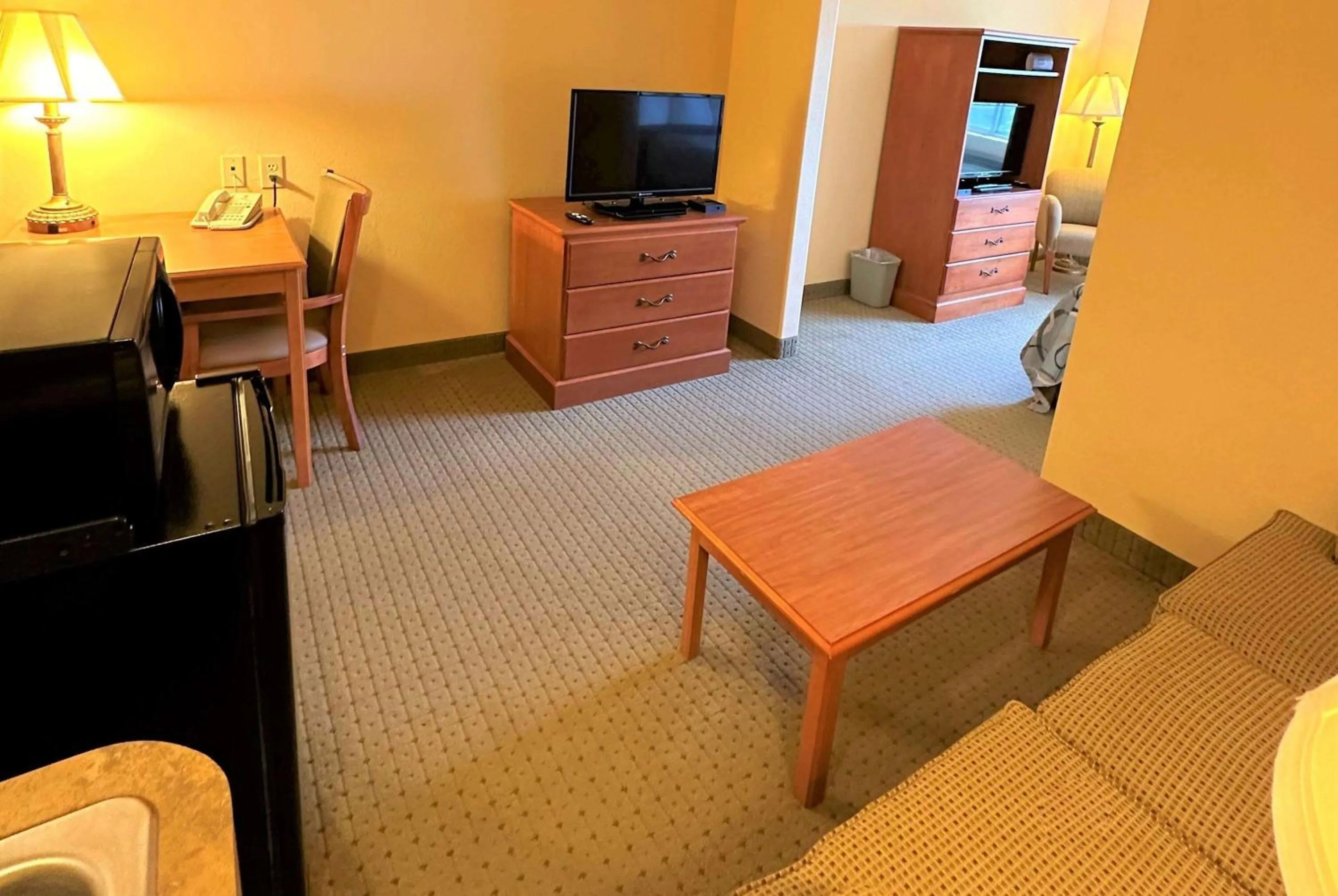 Photo of the whole room in Super 8 by Wyndham Topeka at Forbes Landing