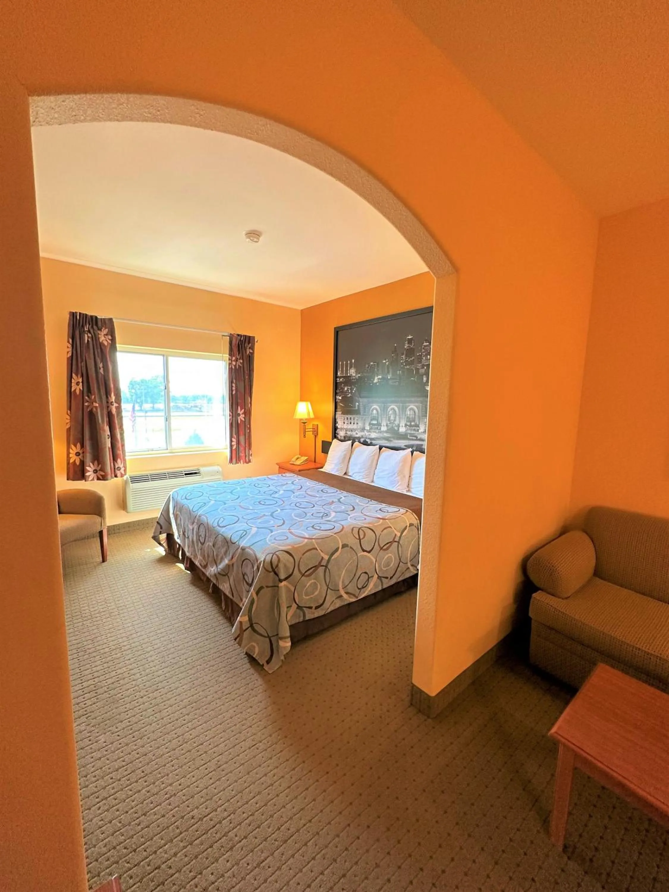 Bed in Super 8 by Wyndham Topeka at Forbes Landing