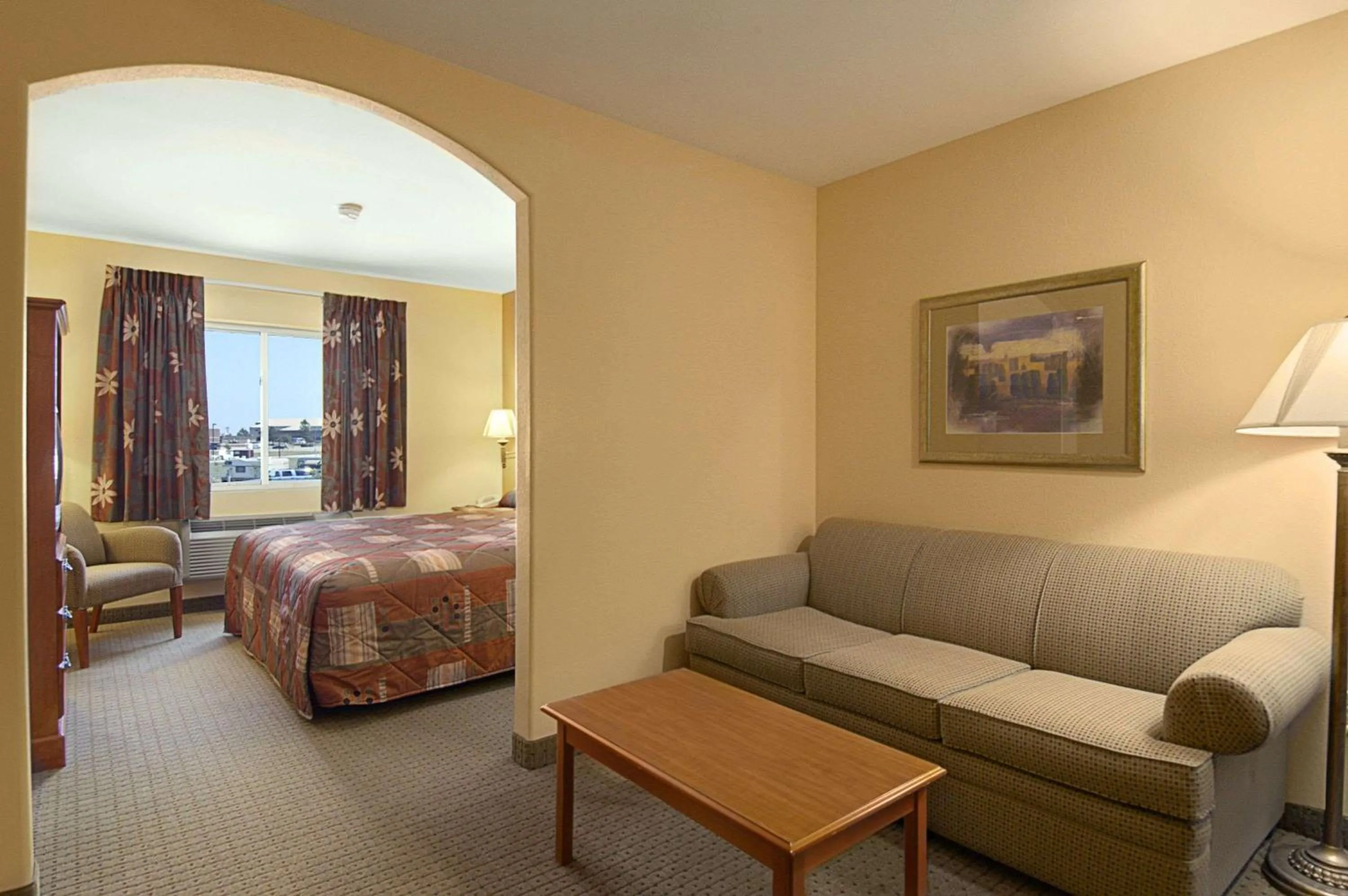 Photo of the whole room, Bed in Super 8 by Wyndham Topeka at Forbes Landing