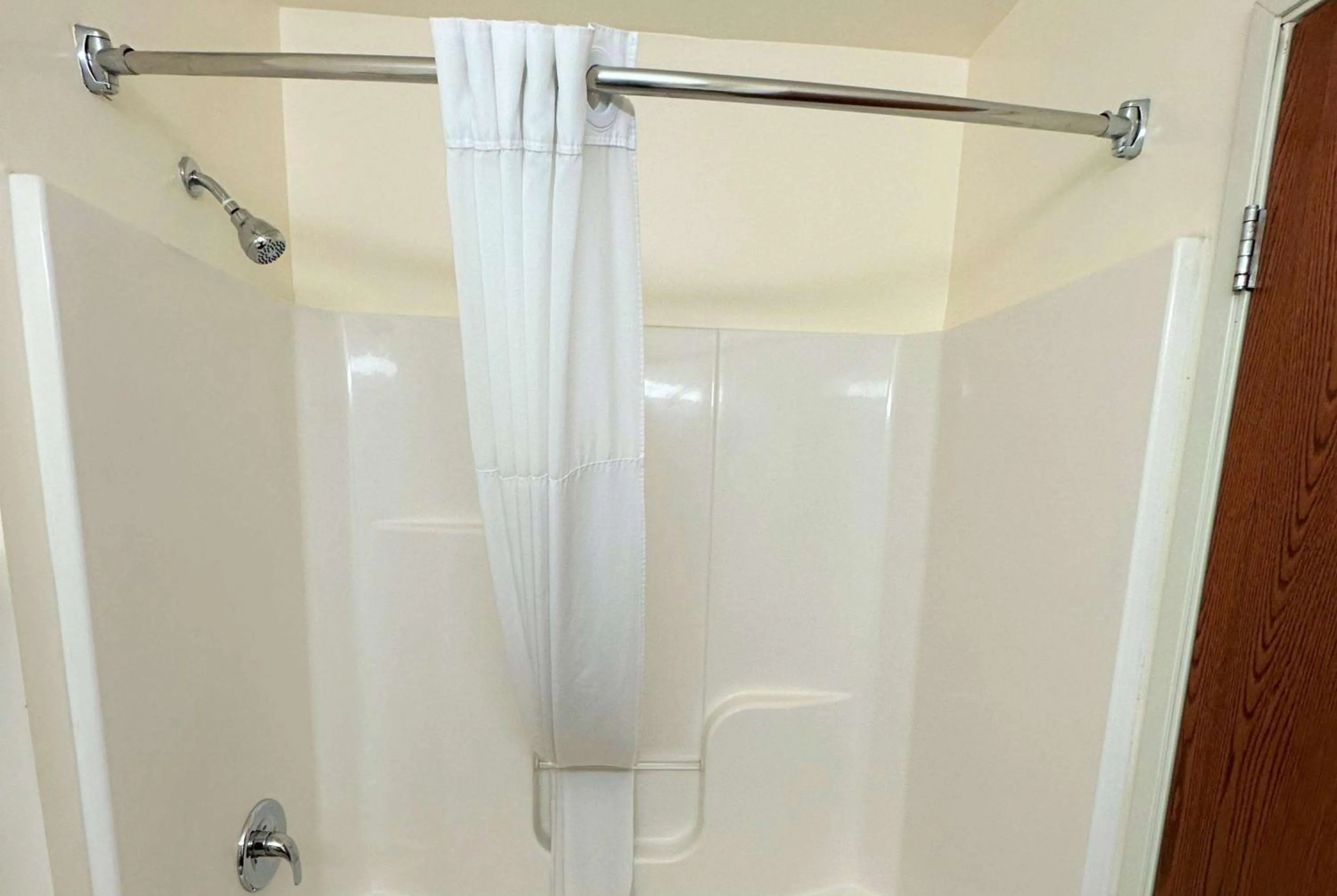 Bathroom in Super 8 by Wyndham Topeka at Forbes Landing