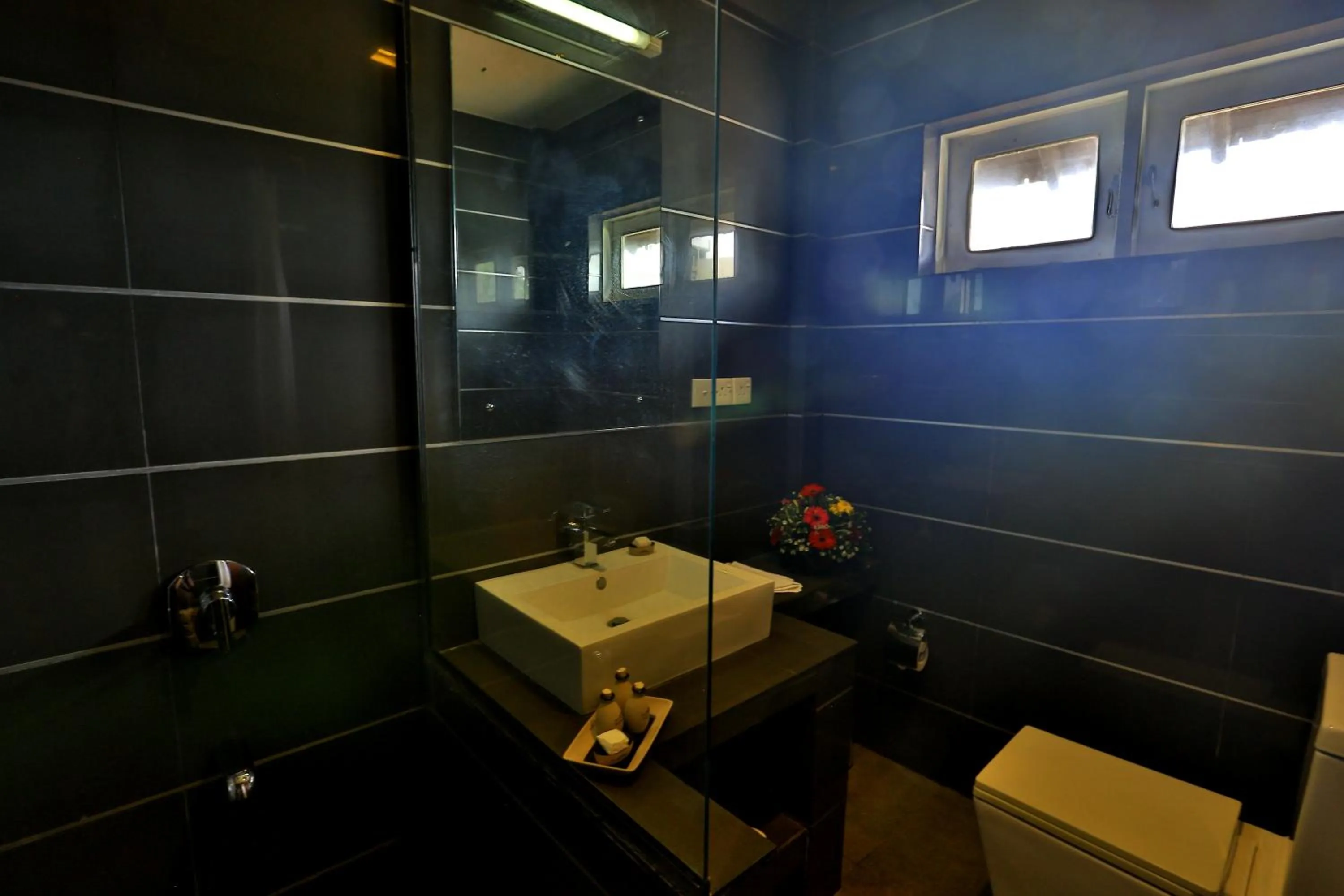 Bathroom in St.Lachlan Hotel & Suites