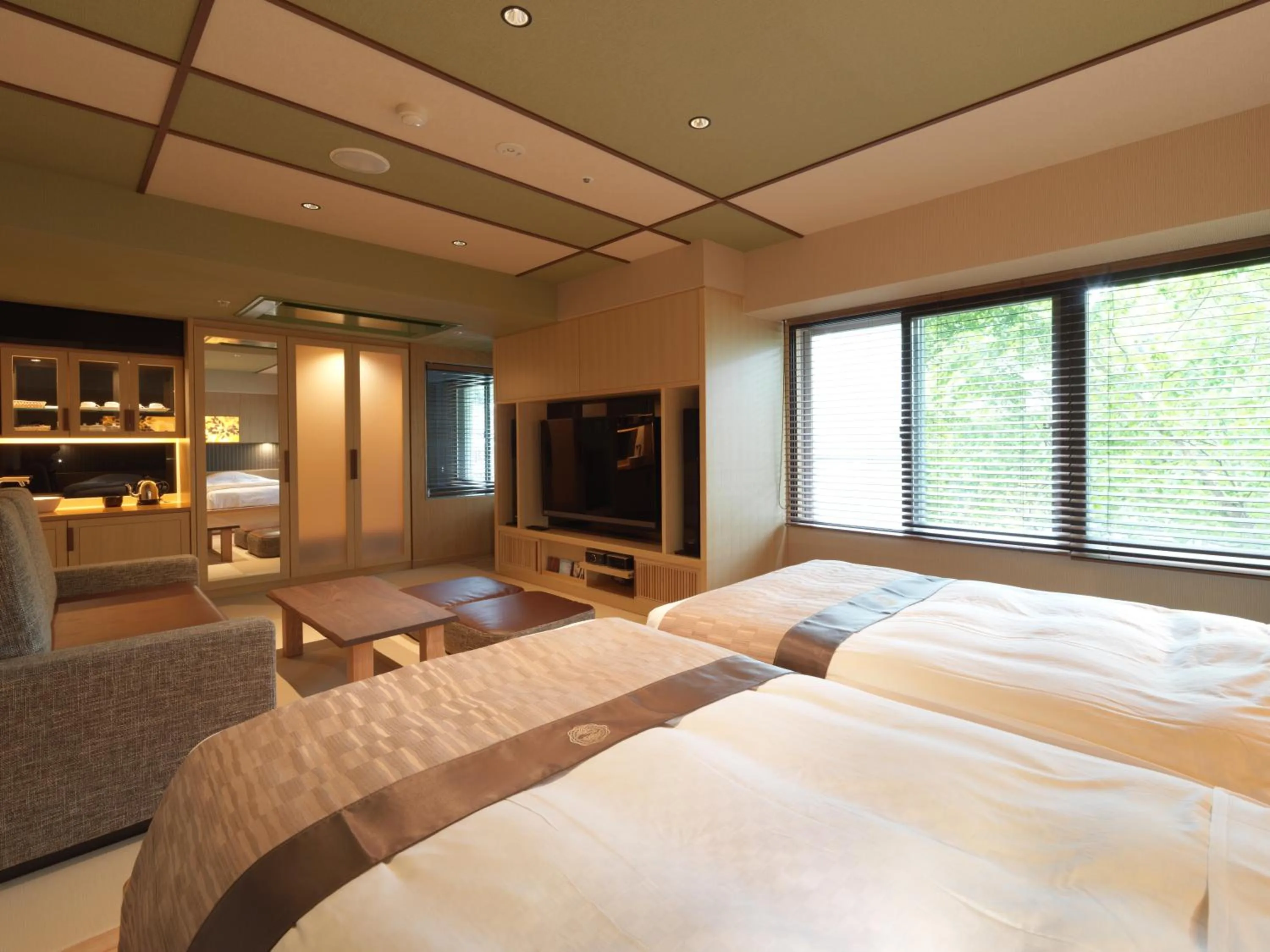 Photo of the whole room, Bed in Akan Yuku no Sato Tsuruga