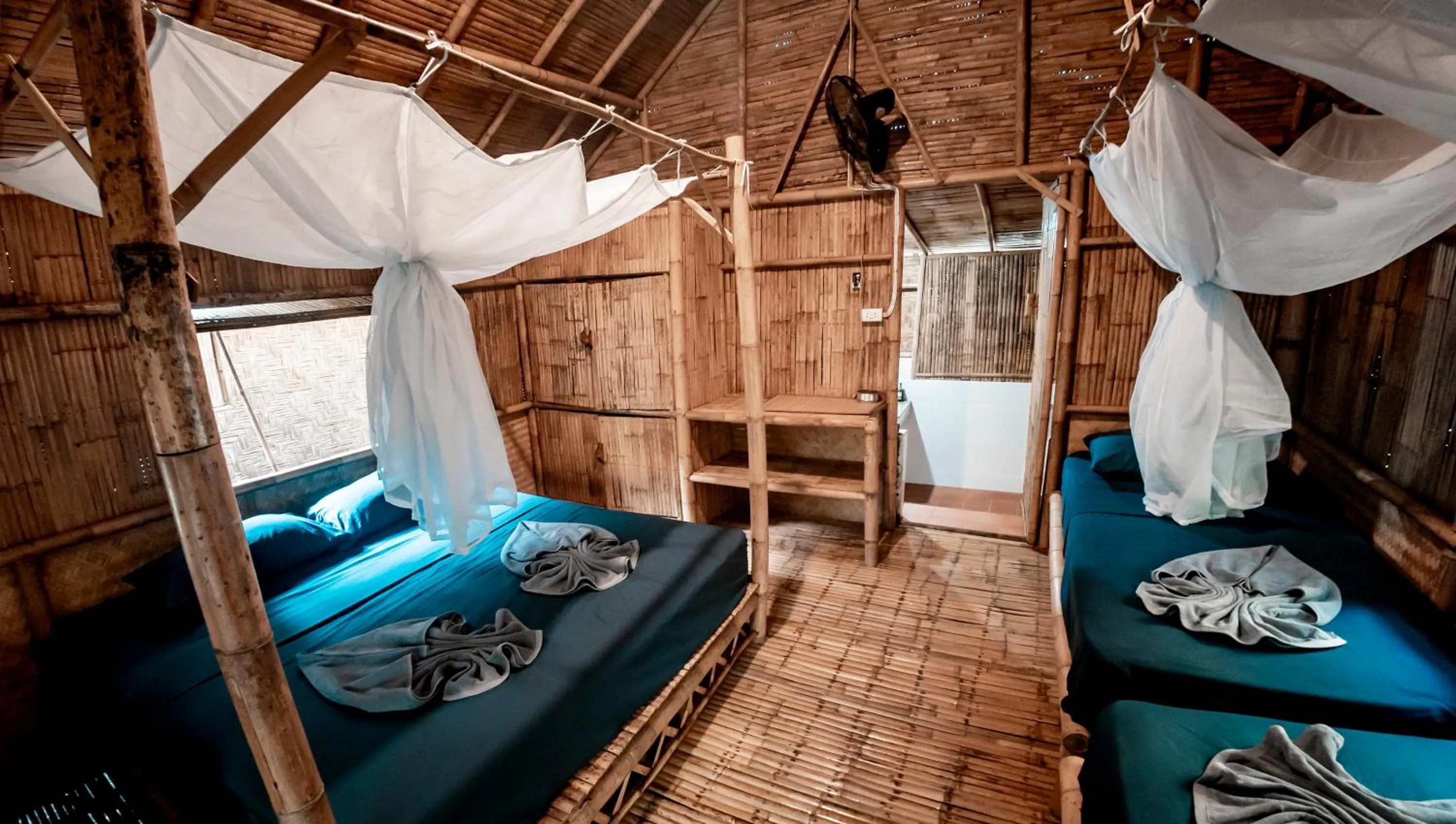 Bed in Green View Beach Resort