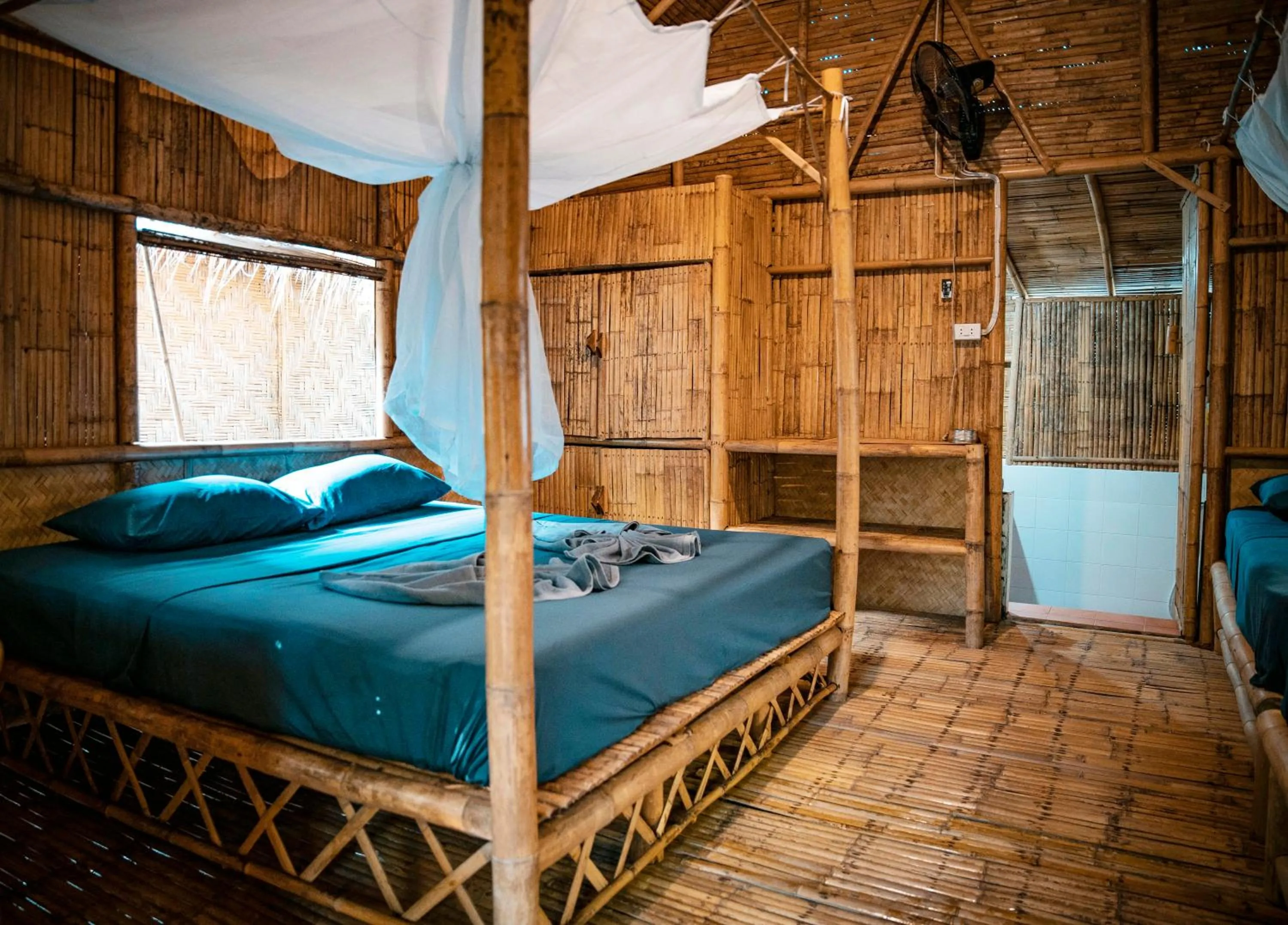 Bed in Green View Beach Resort