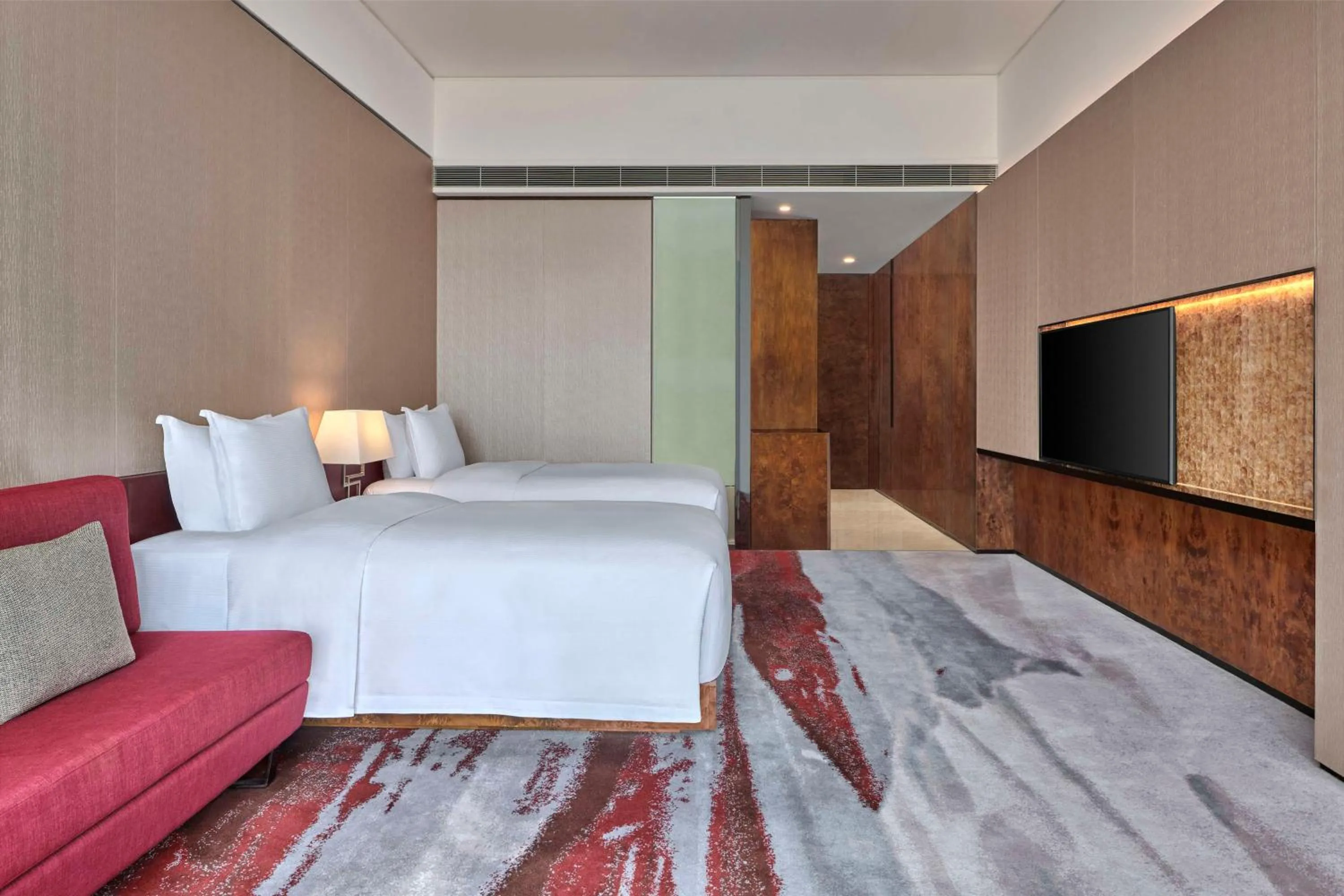 Living room, Bed in Hilton Guangzhou Tianhe