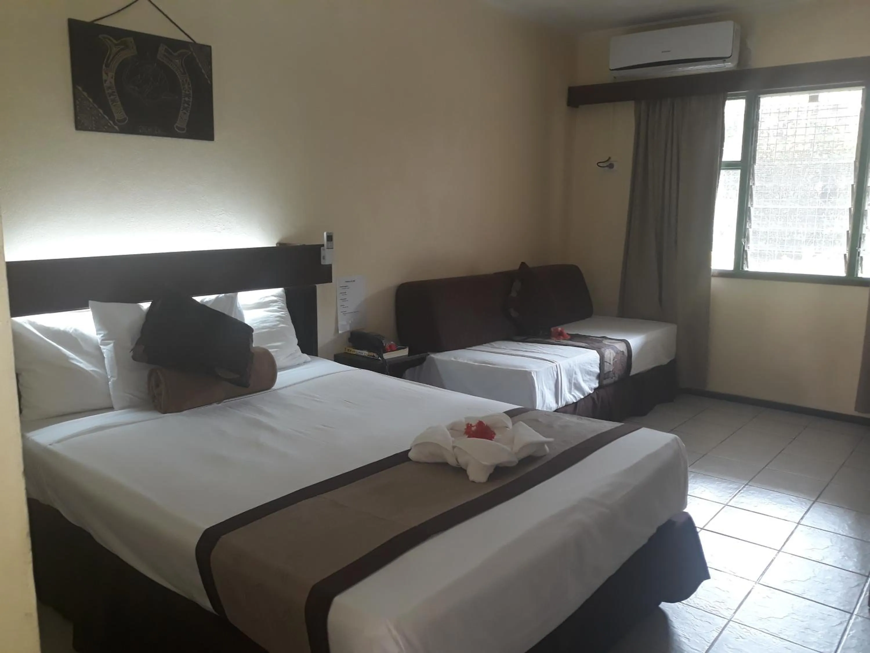 Bed in Grand Eastern Hotel