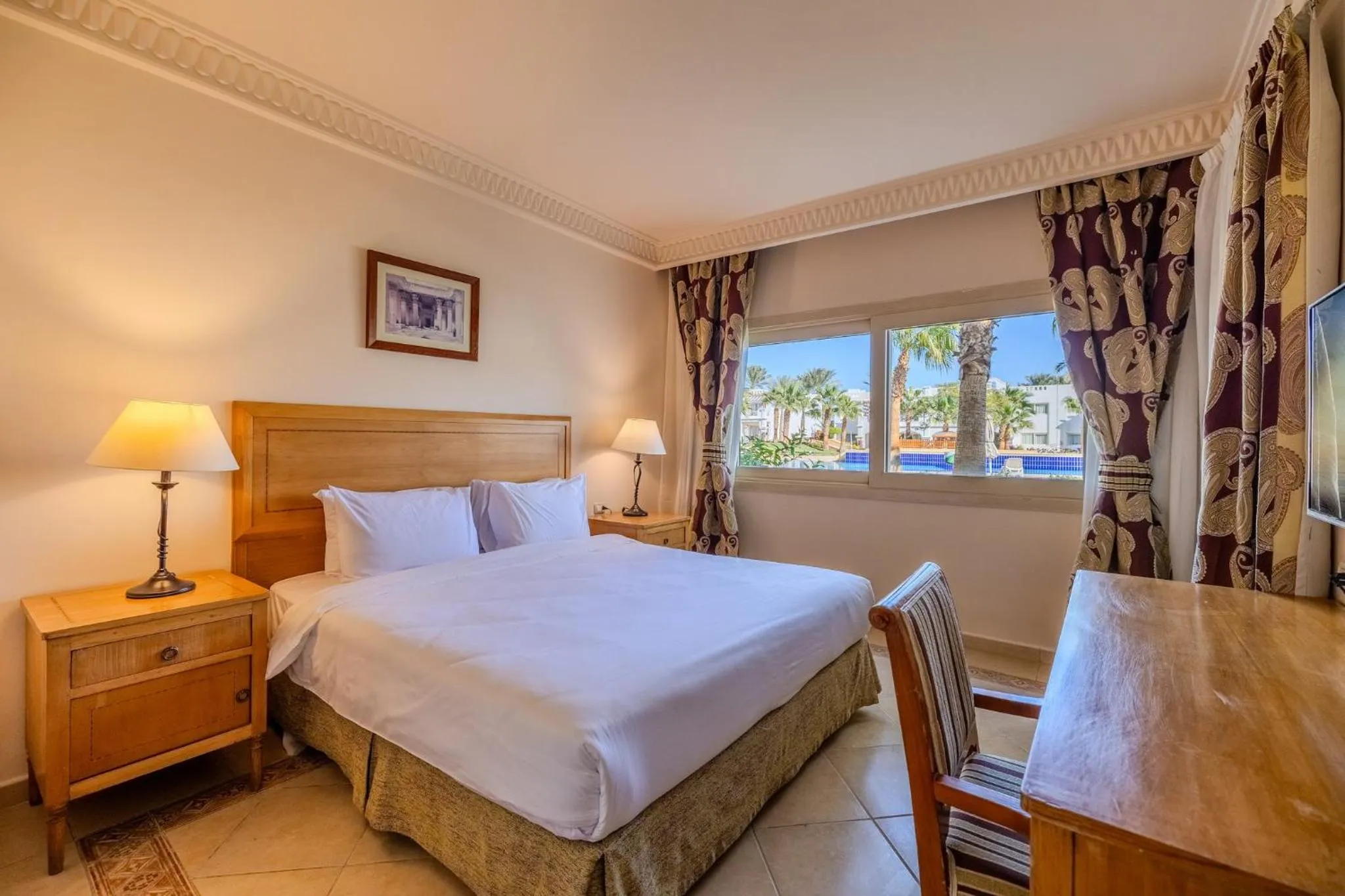 Photo of the whole room, Bed in Continental Plaza Beach Resort