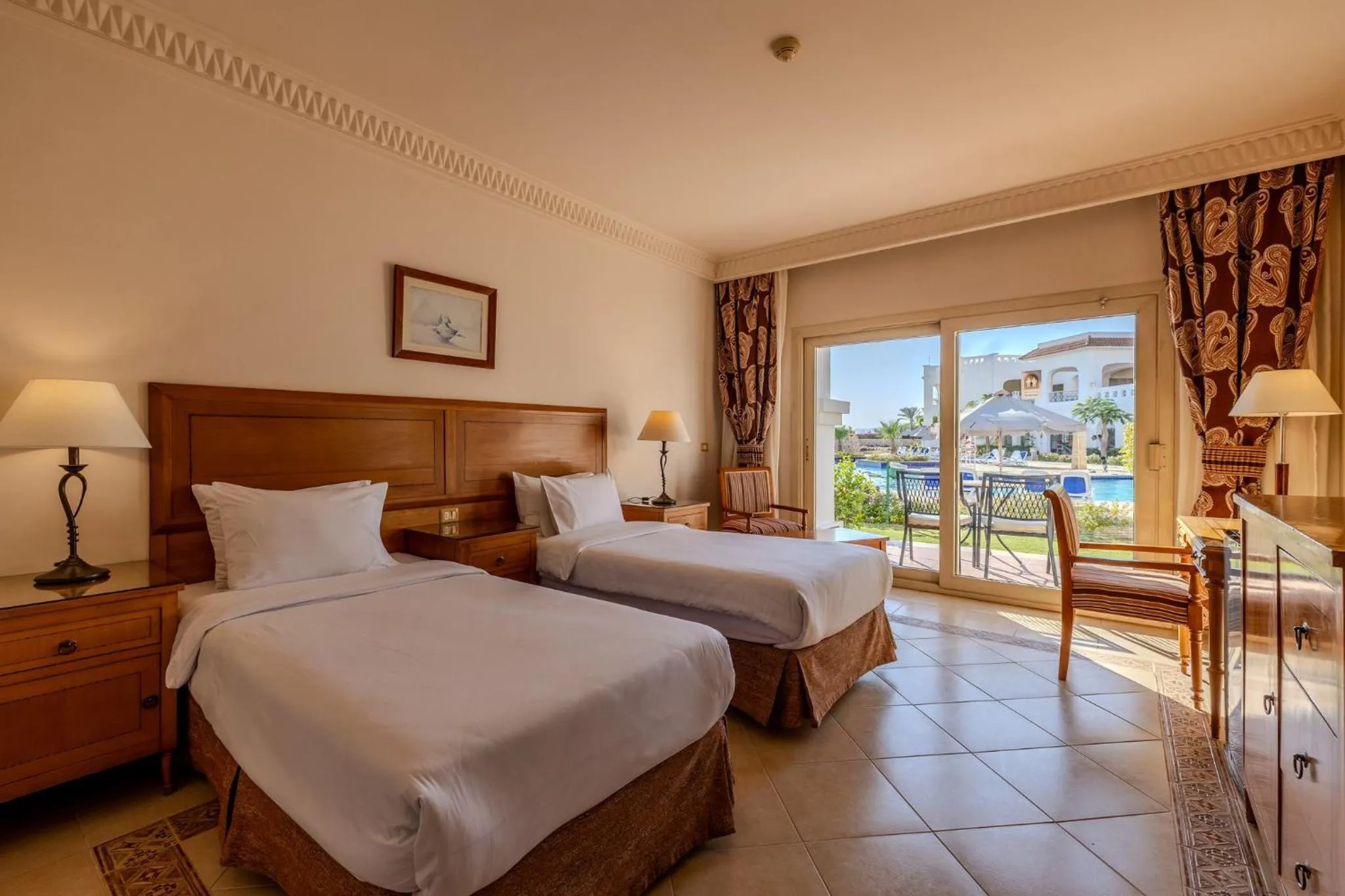 Photo of the whole room, Bed in Continental Plaza Beach Resort