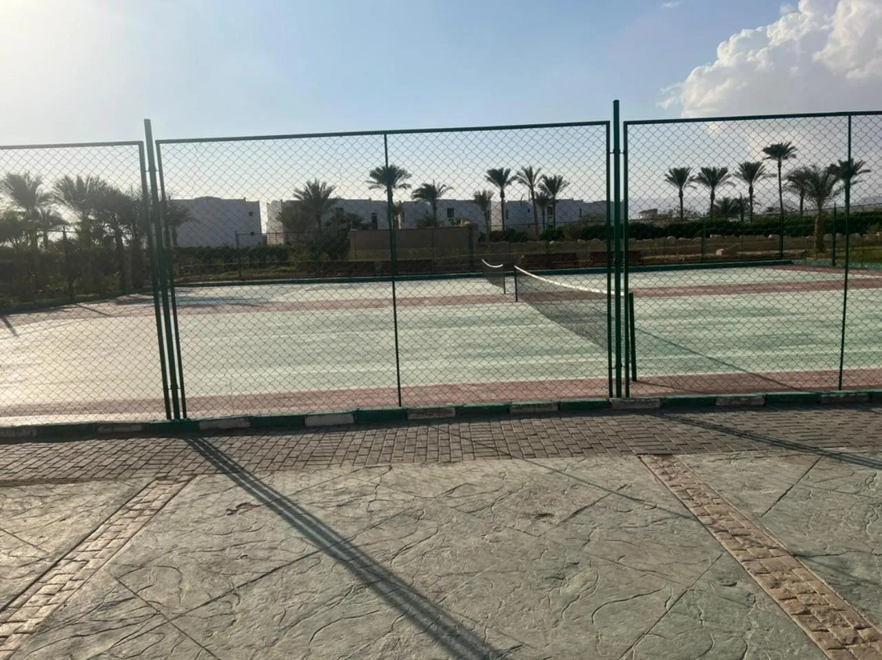Tennis court in Continental Plaza Beach Resort