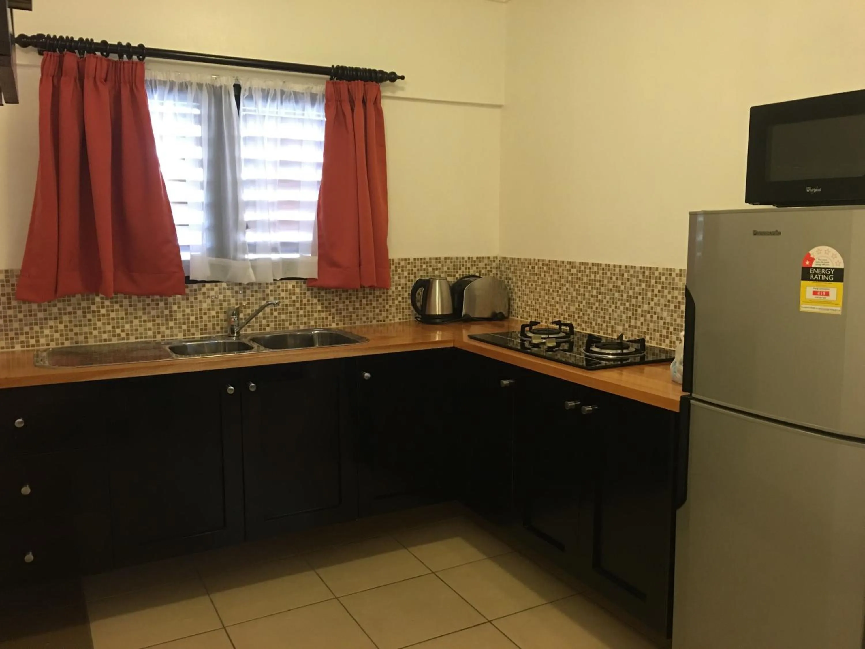 Kitchen or kitchenette in Suva Motor Inn