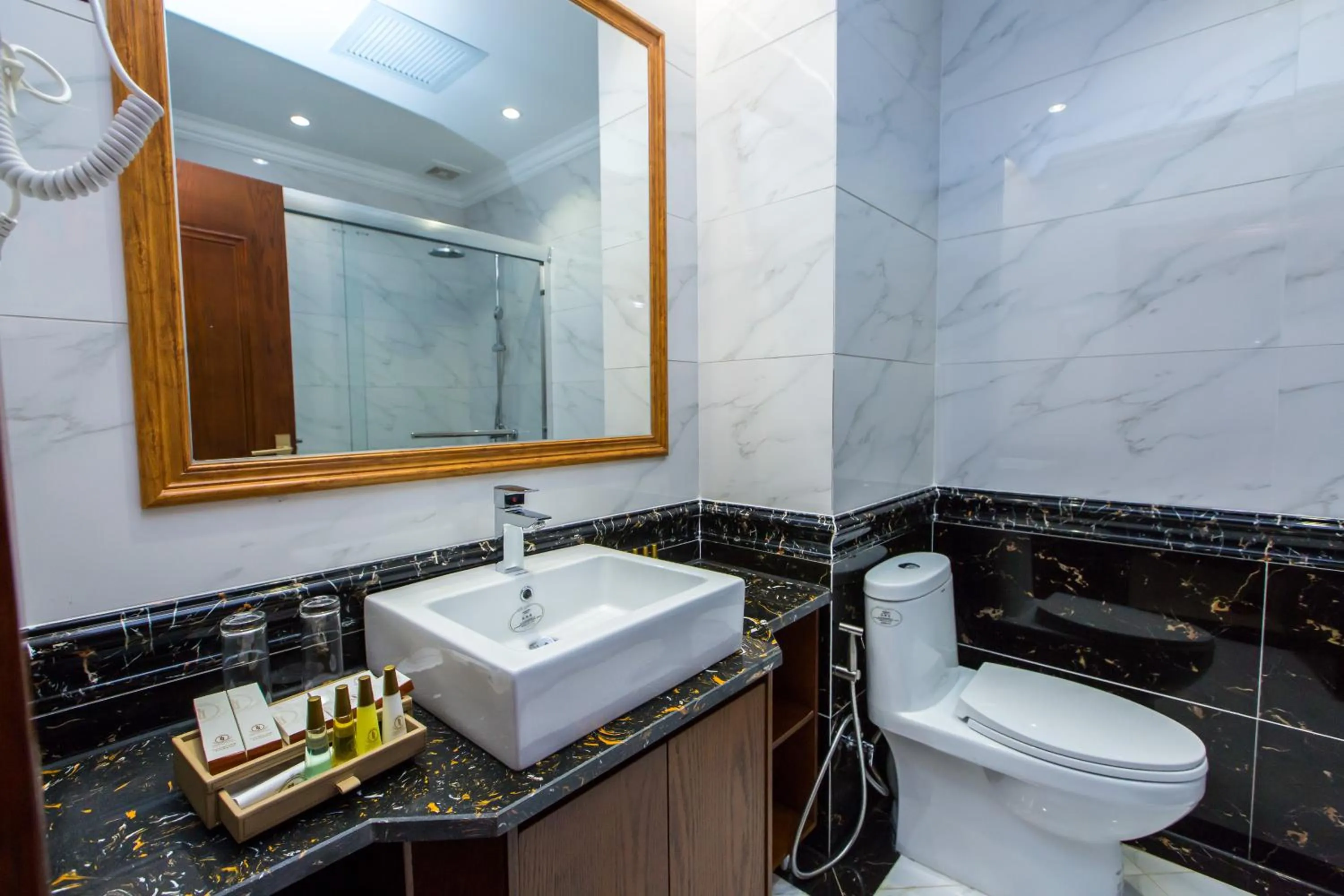 Bathroom in Paksong Danngarm Hotel