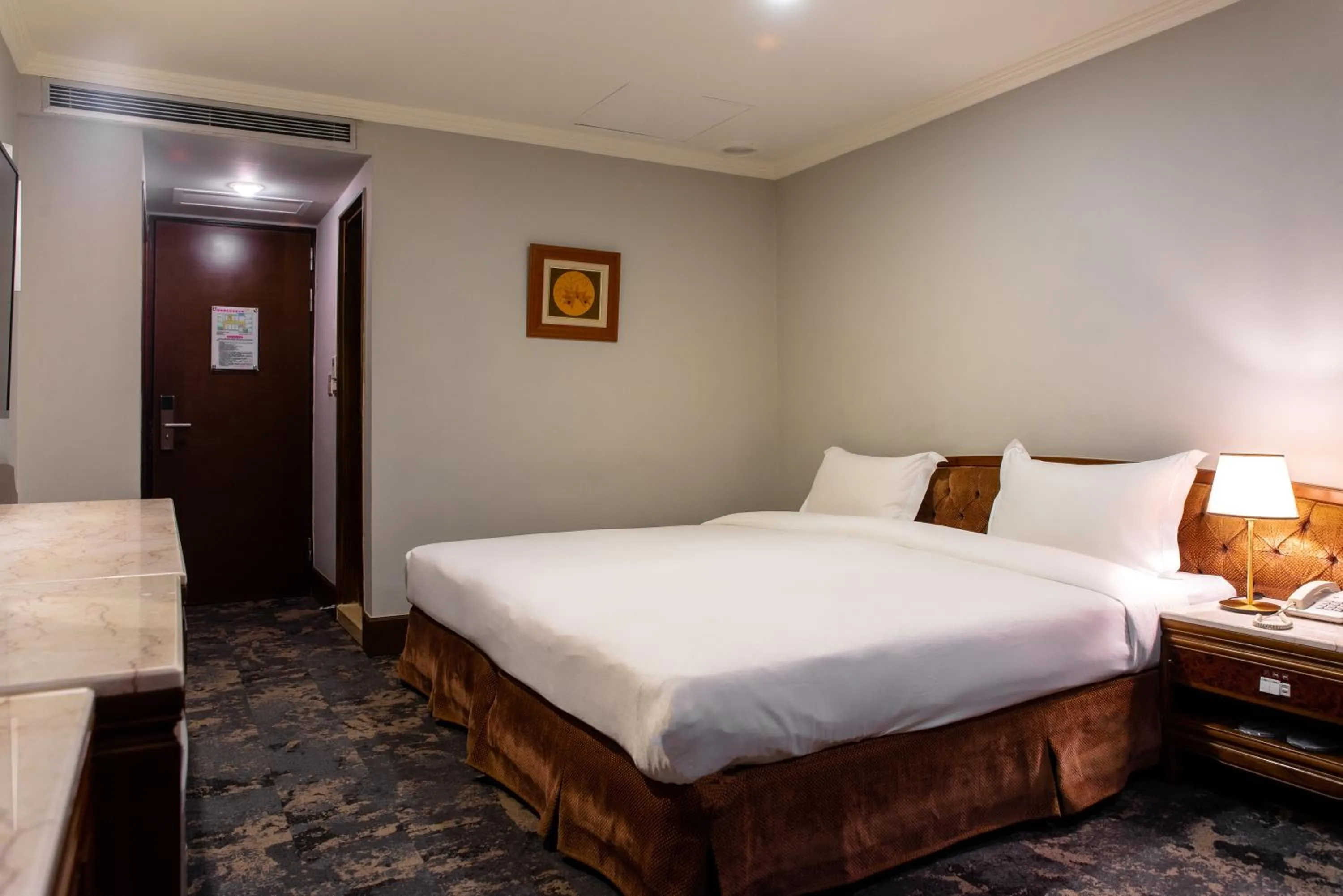 Bed in Chiayi King Hotel