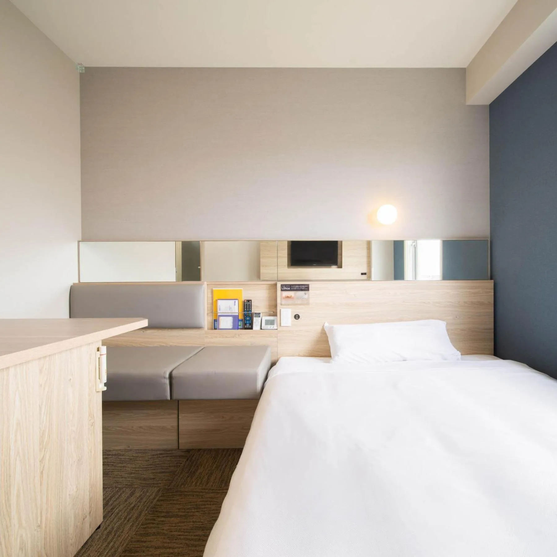 Bed in Super Hotel Okinawa Nago