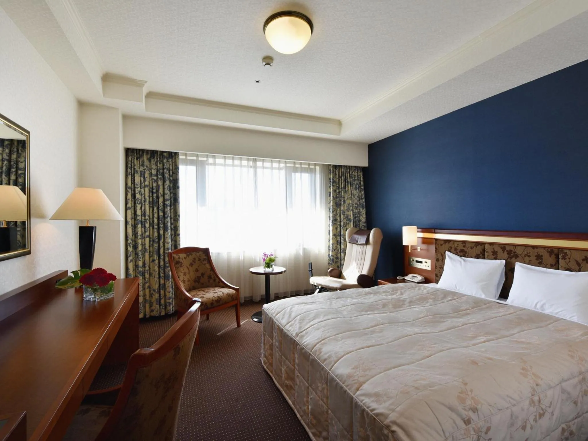 Bed in Hotel Crown Palais Chiryu