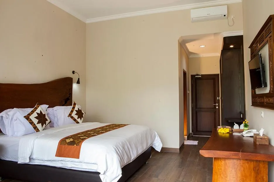 Bed in Villa Sawah Resort Managed by Salak Hospitality