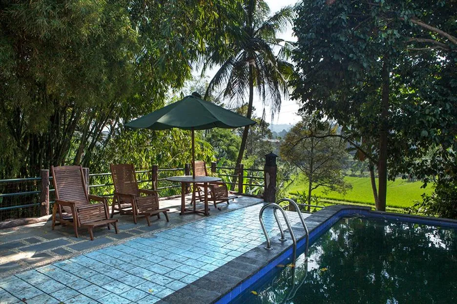 Swimming pool in Villa Sawah Resort Managed by Salak Hospitality