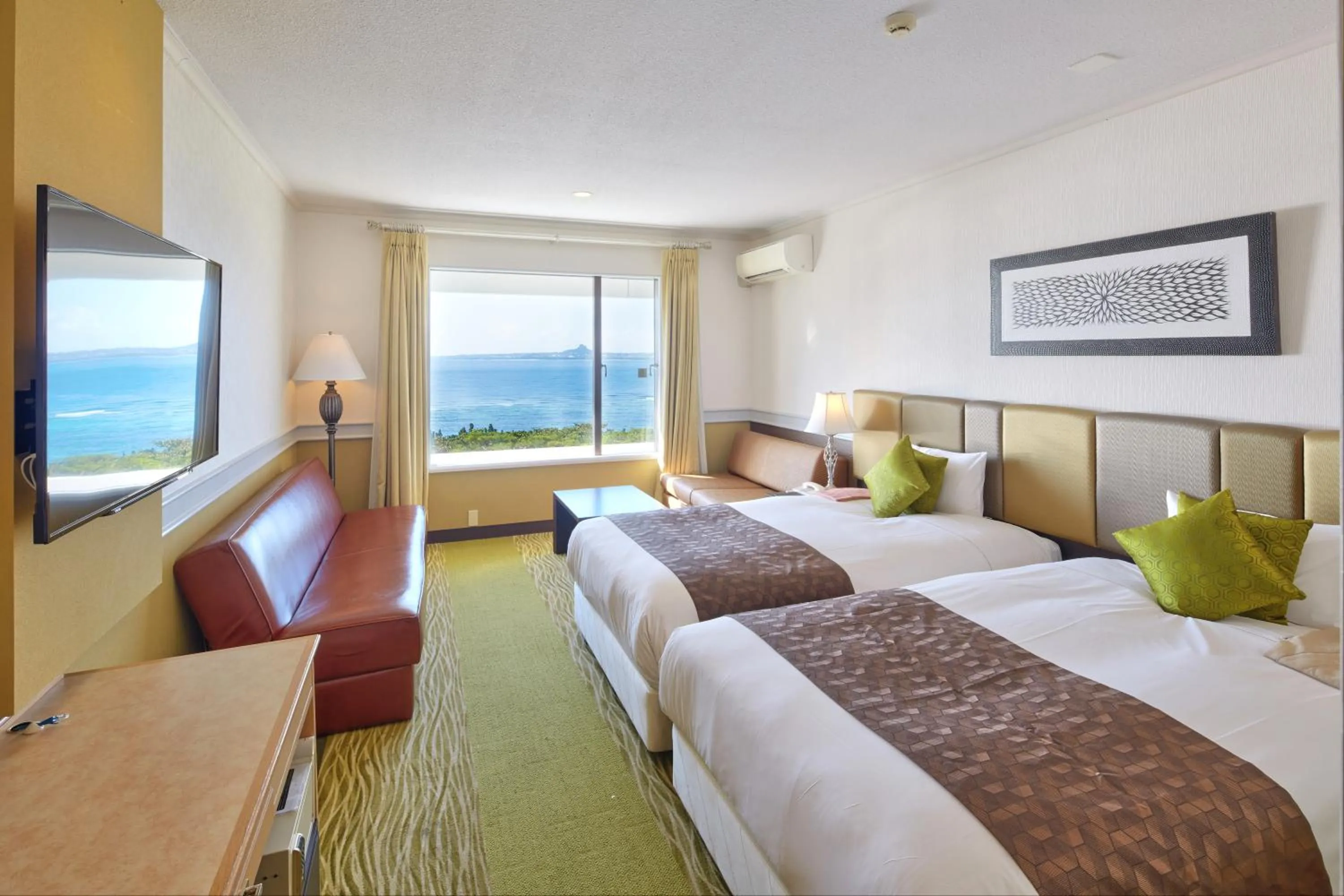 Photo of the whole room, Bed in Royal View Hotel Churaumi