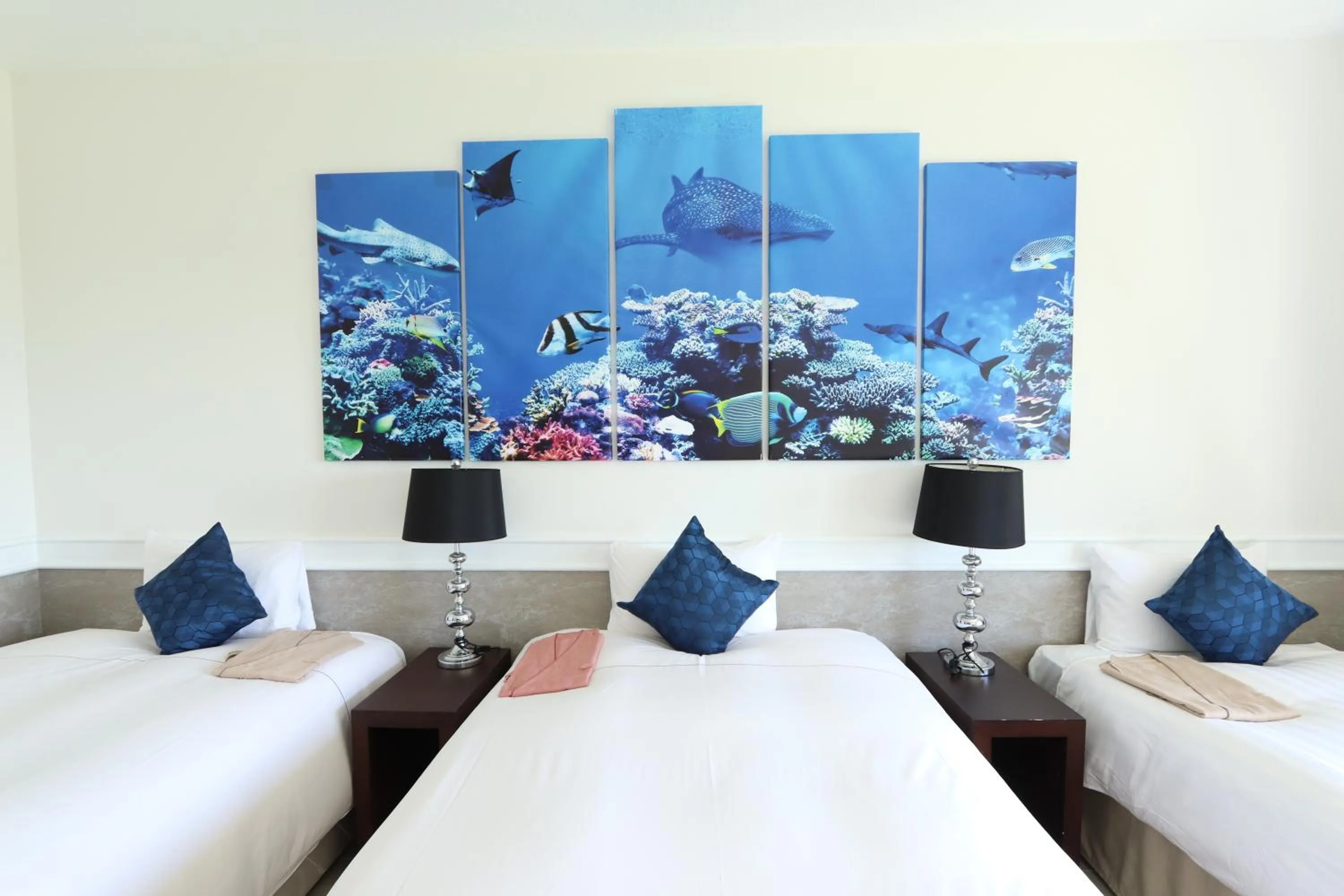 Photo of the whole room, Bed in Royal View Hotel Churaumi