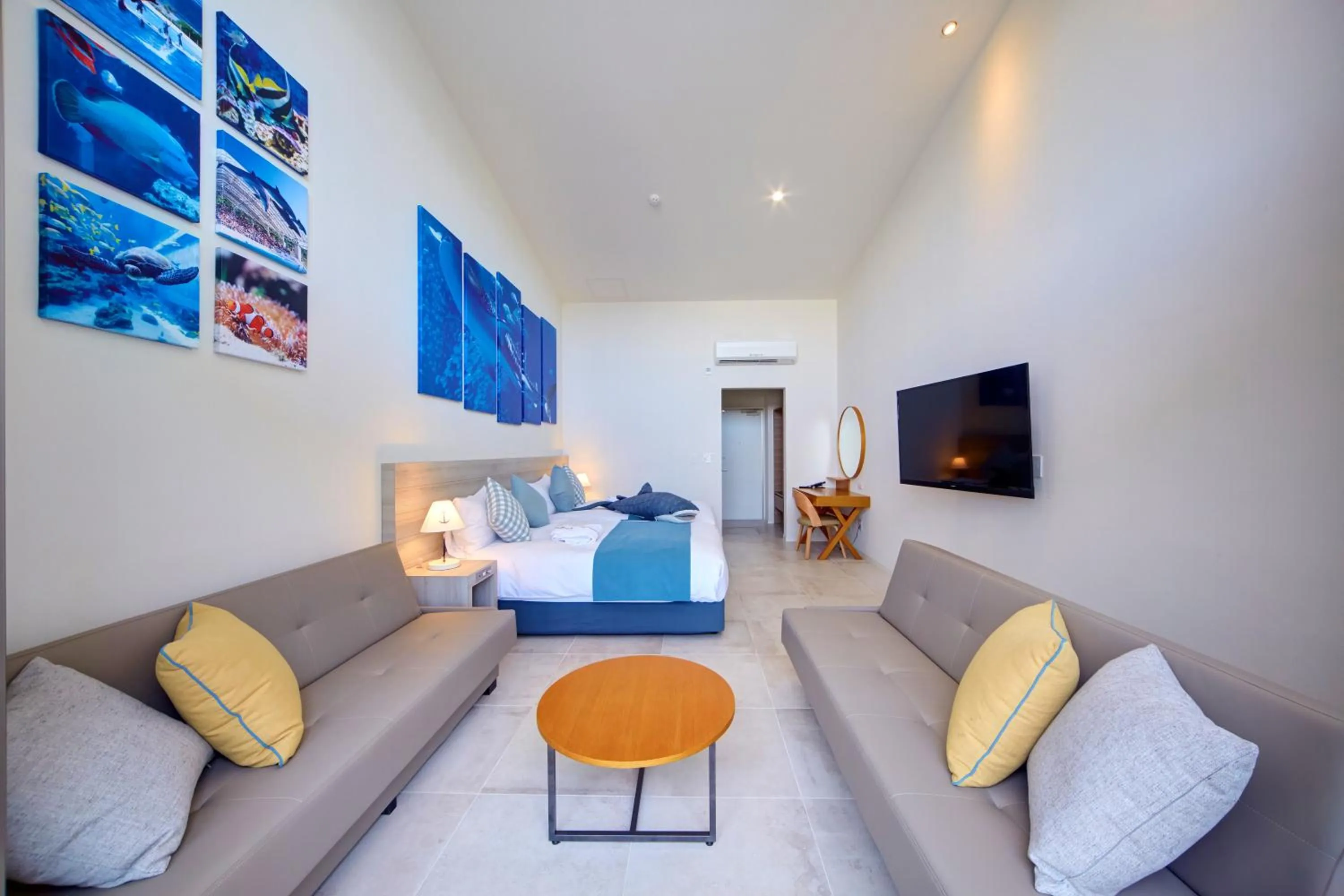 Photo of the whole room in Royal View Hotel Churaumi