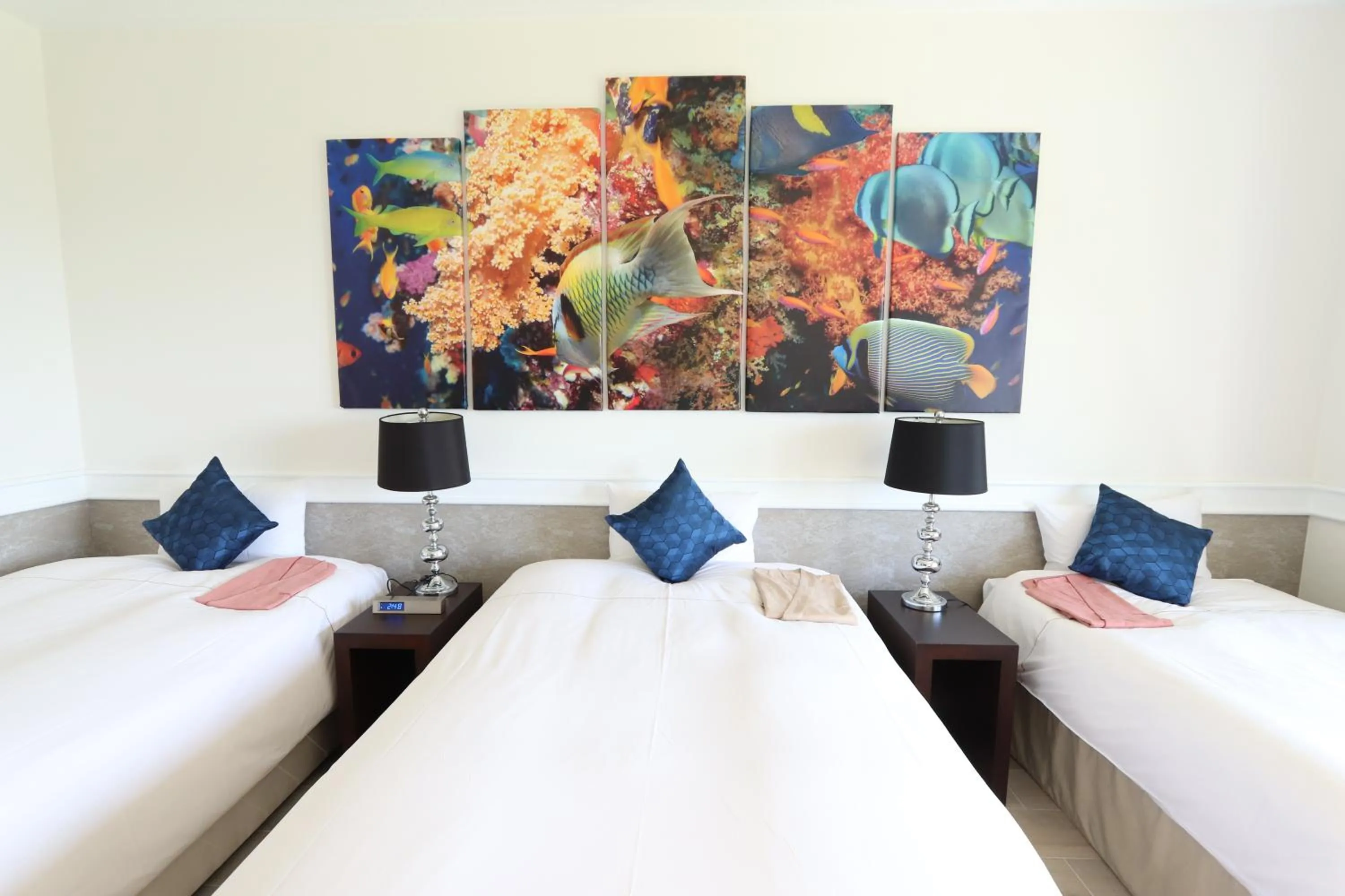 Photo of the whole room, Bed in Royal View Hotel Churaumi