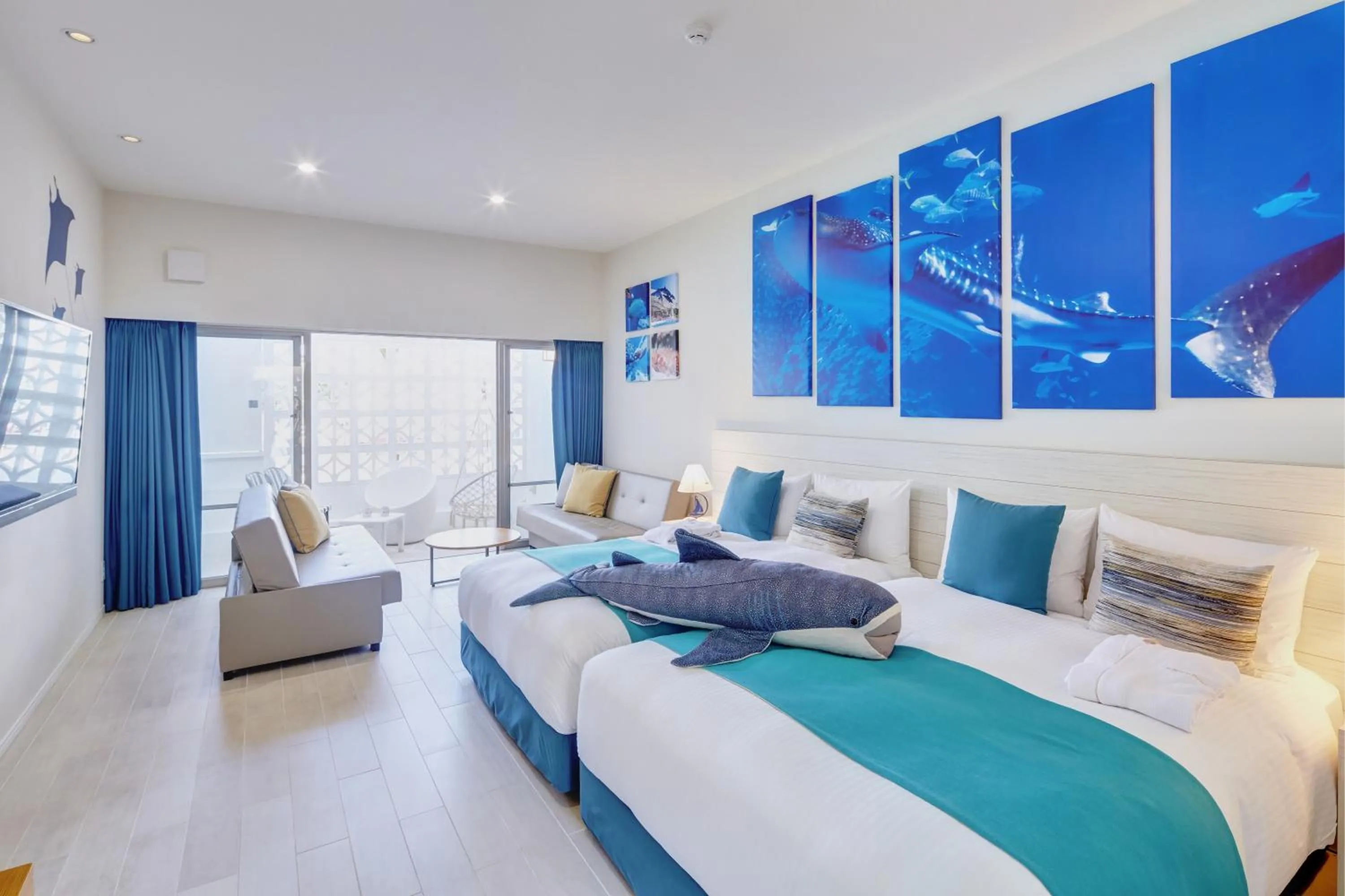 Photo of the whole room, Bed in Royal View Hotel Churaumi