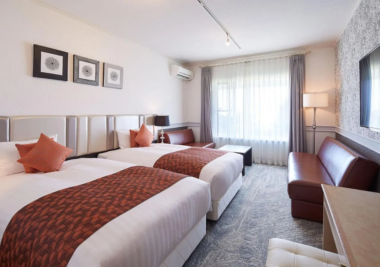 Photo of the whole room, Bed in Royal View Hotel Churaumi