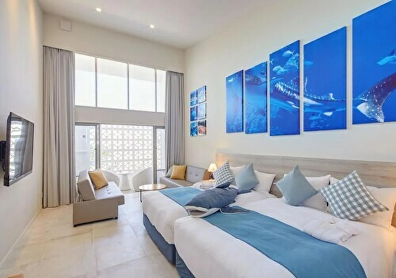 Photo of the whole room, Bed in Royal View Hotel Churaumi