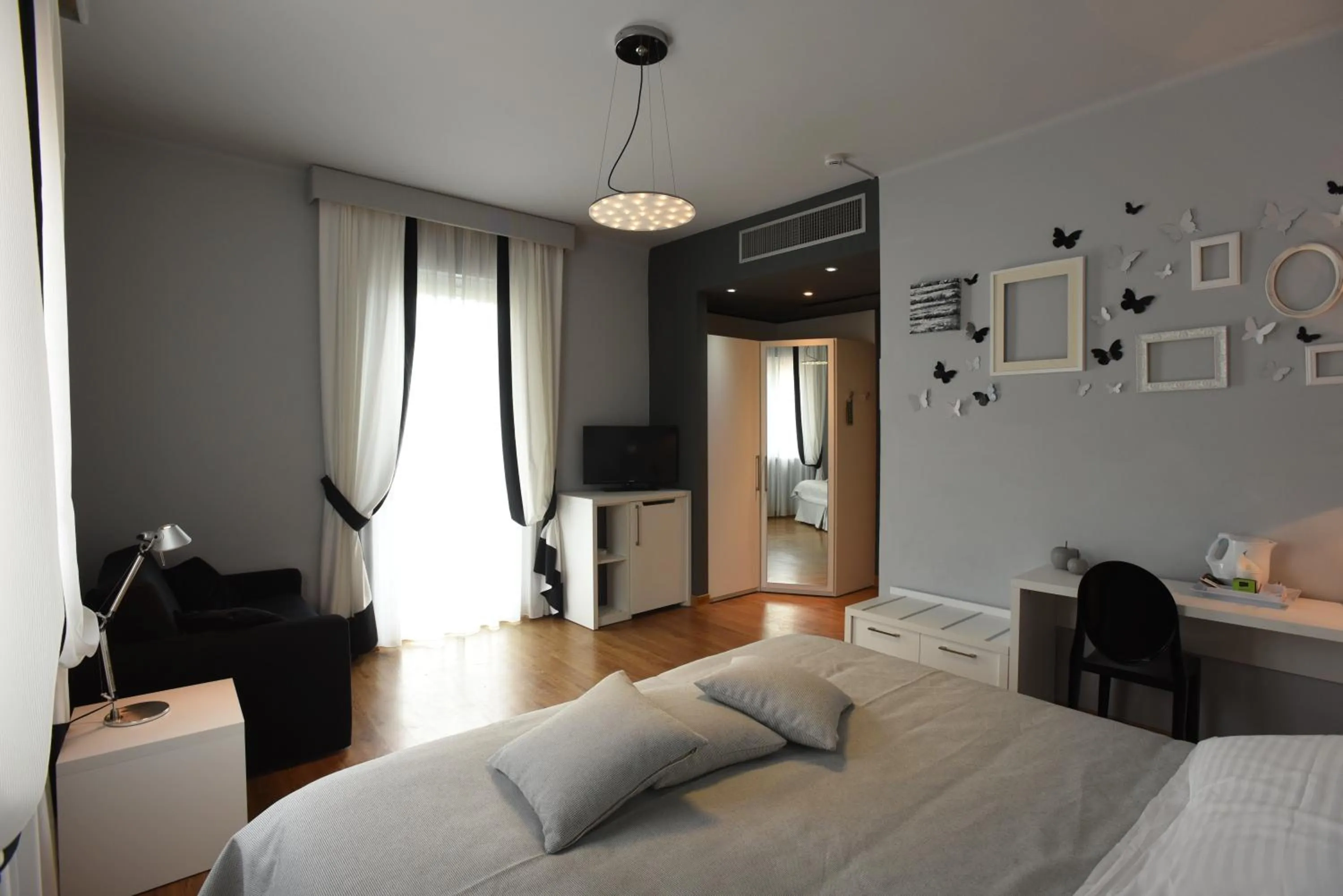 Bedroom in Hotel La Vigna